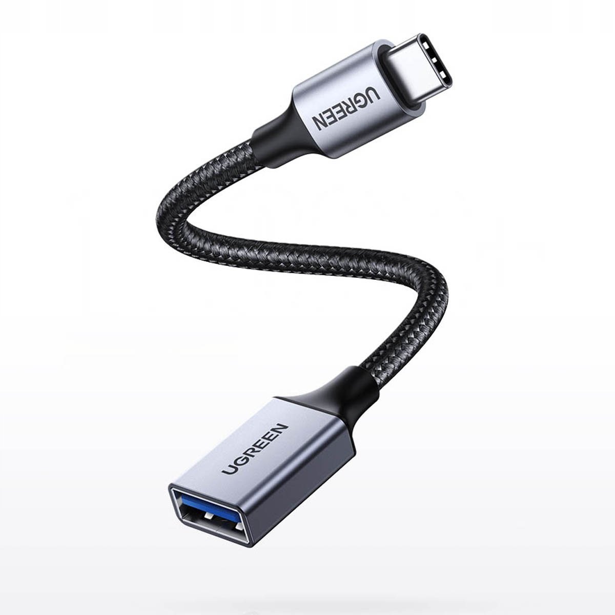 Srebrny kabel adapter UGREEN USB-C do USB-A na białym tle.