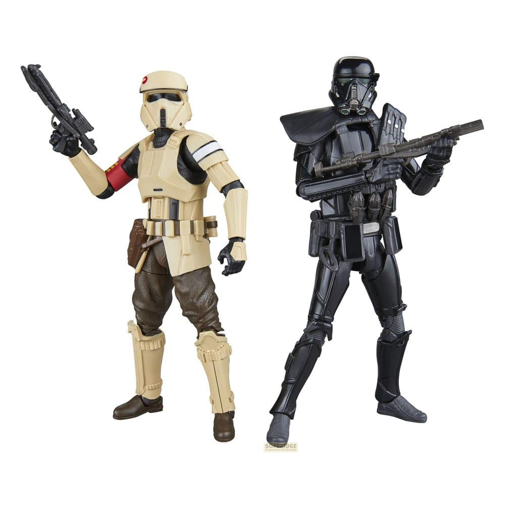 Deux figurines Star Wars, une beige avec brassard rouge, l'autre noire.