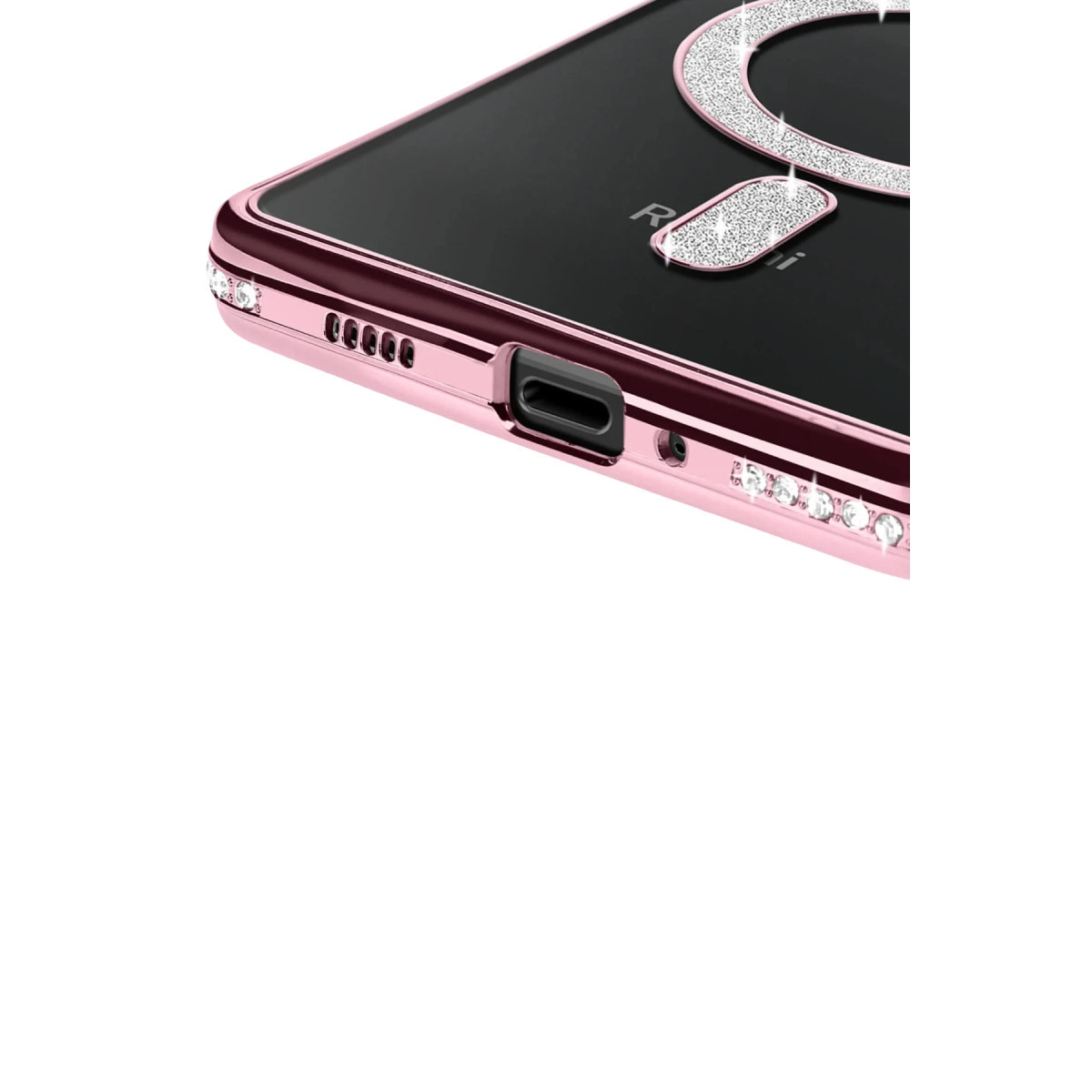 Kristal ve hoparlör ızgaralarıyla süslenmiş rose gold telefon kılıfı.