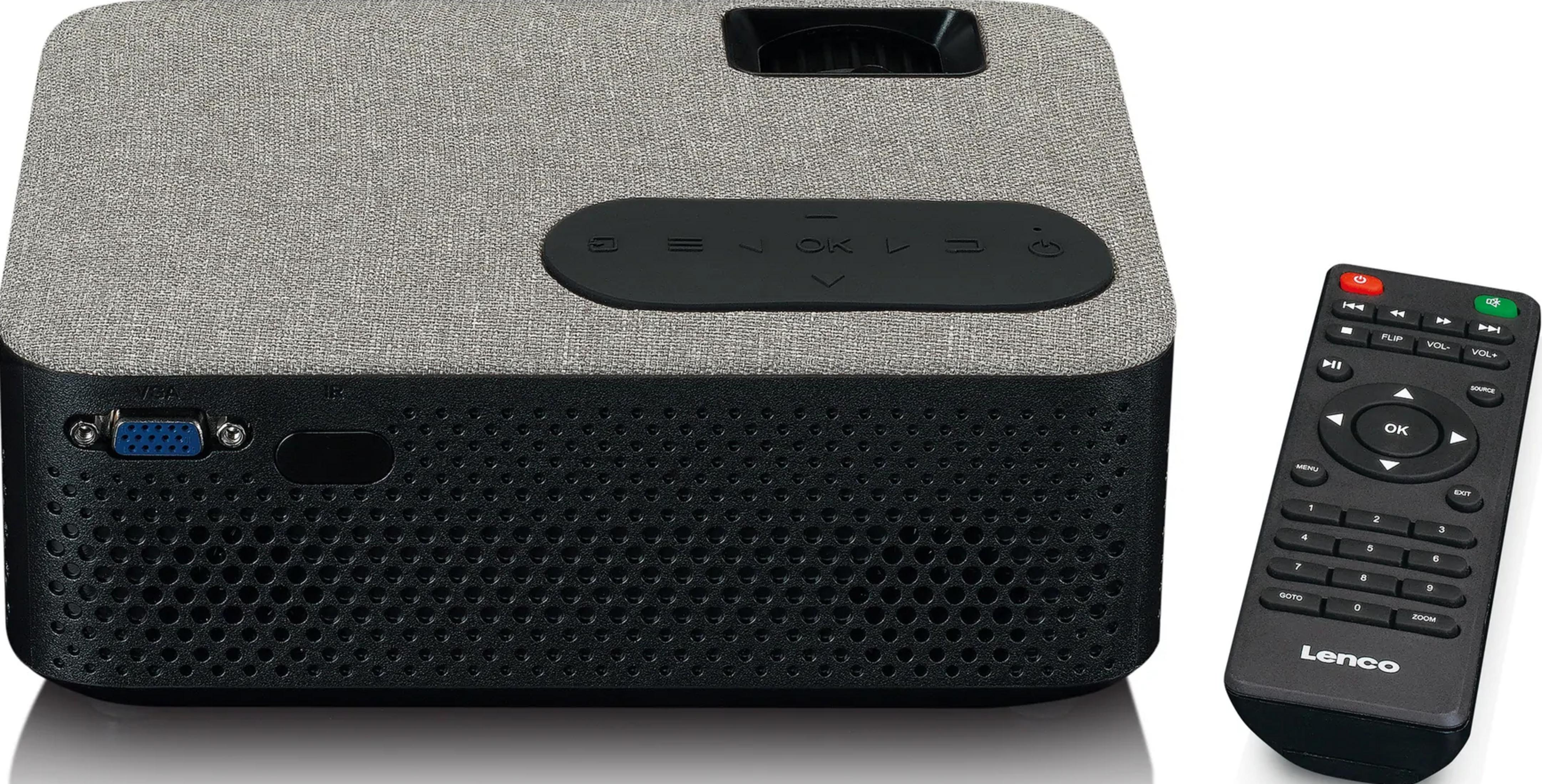 Szary projektor z czarnym pilotem obok.