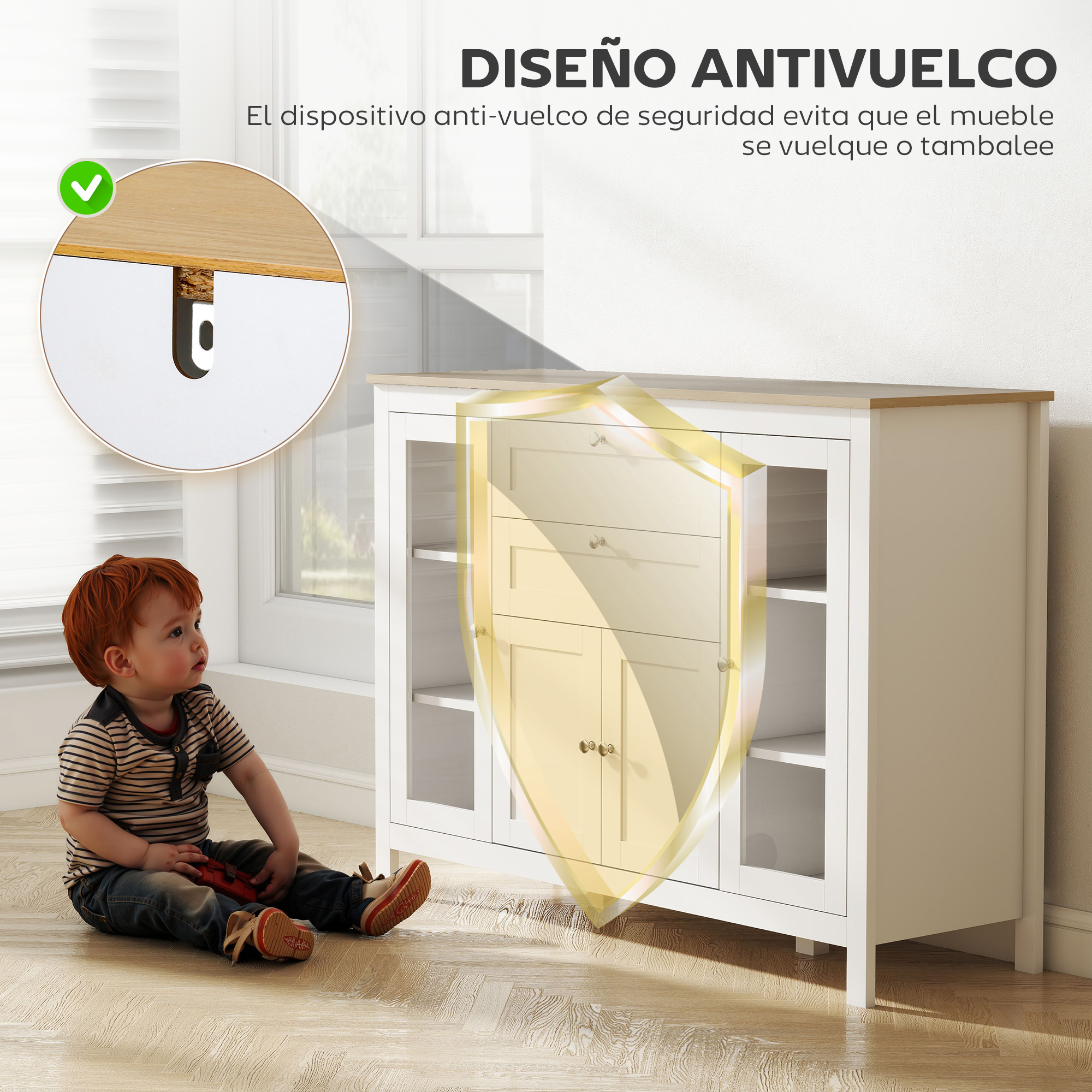 Niño pequeño sentado junto a mueble blanco con dispositivo antivuelco; se muestra detalle.