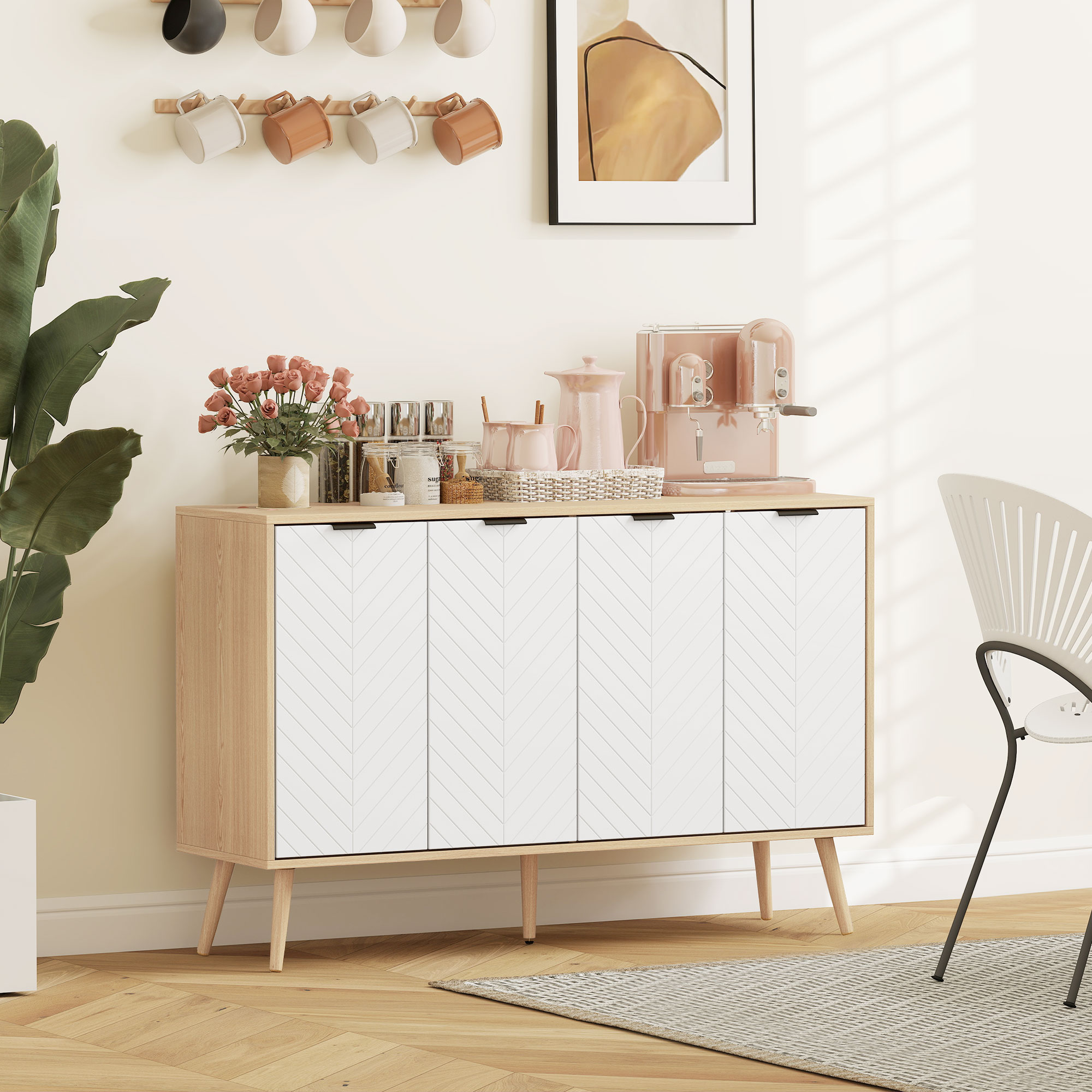 Un armario de madera con puertas blancas, cafetera, olla y flores.