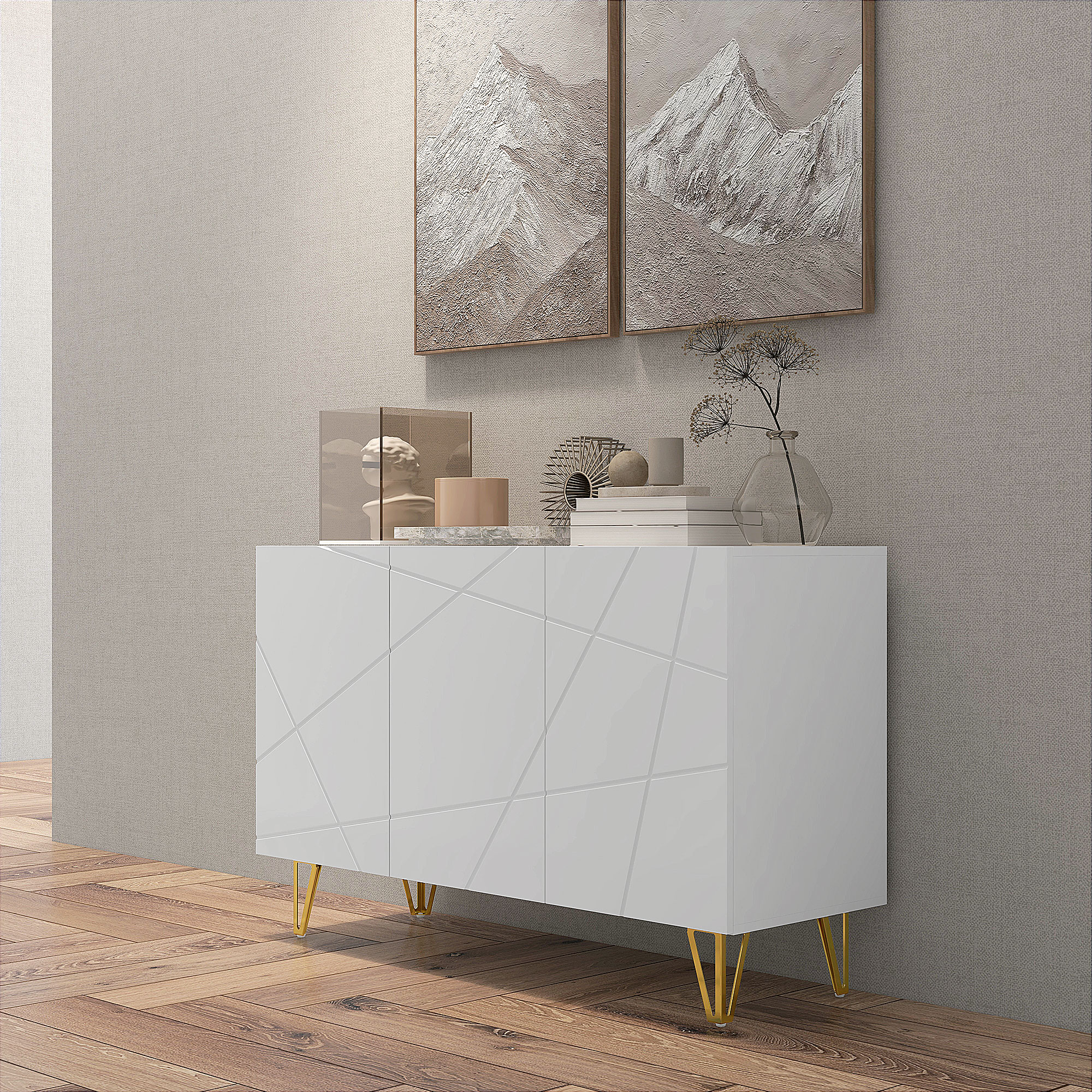 Un aparador blanco con patrón geométrico y patas doradas.