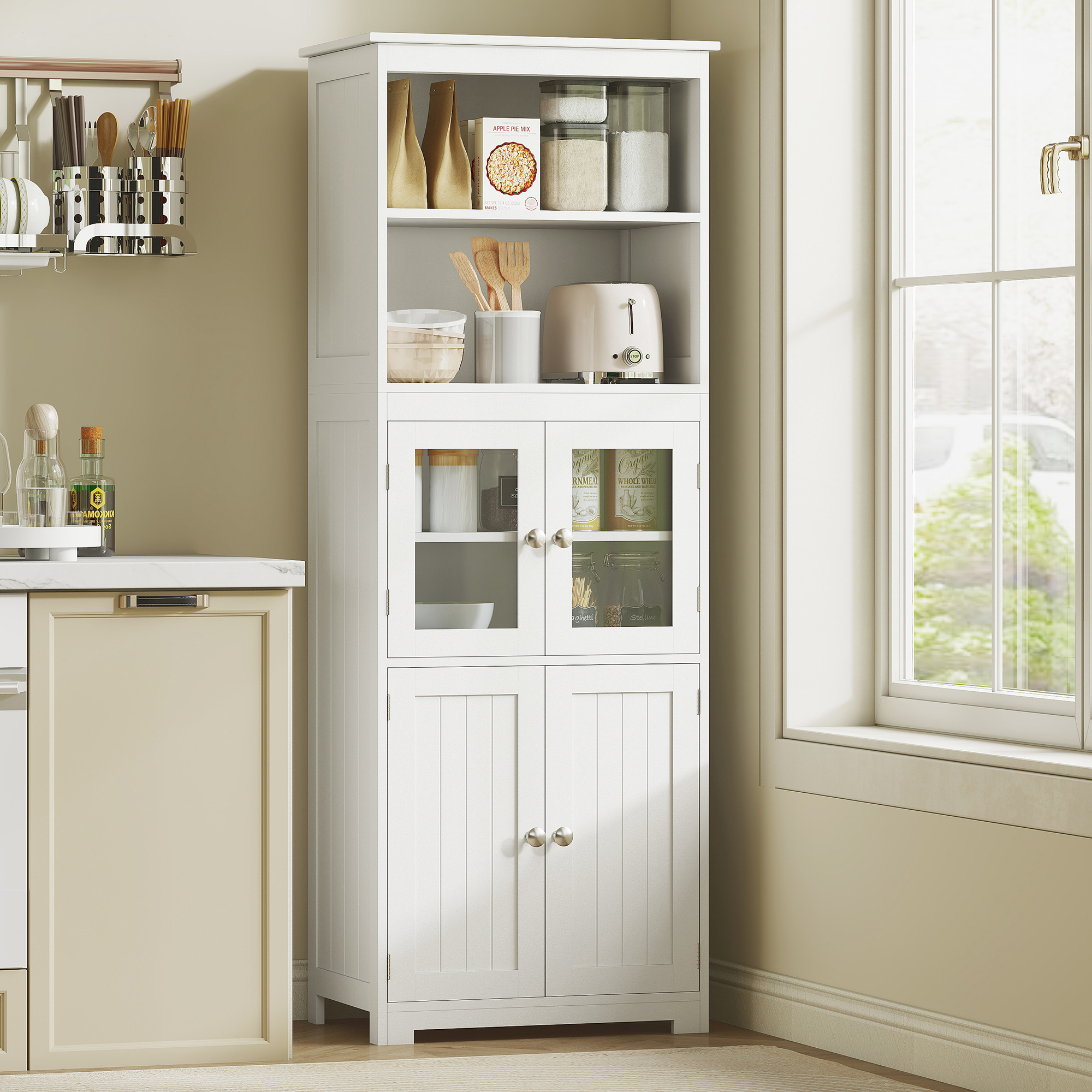 Un armario de cocina blanco con puertas de cristal junto a una ventana. Arriba hay comida y utensilios.