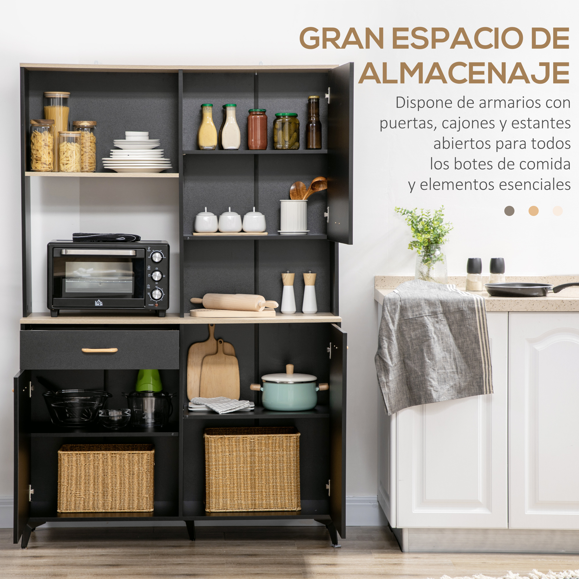Un mueble de cocina negro con frascos, platos, horno y cestas.