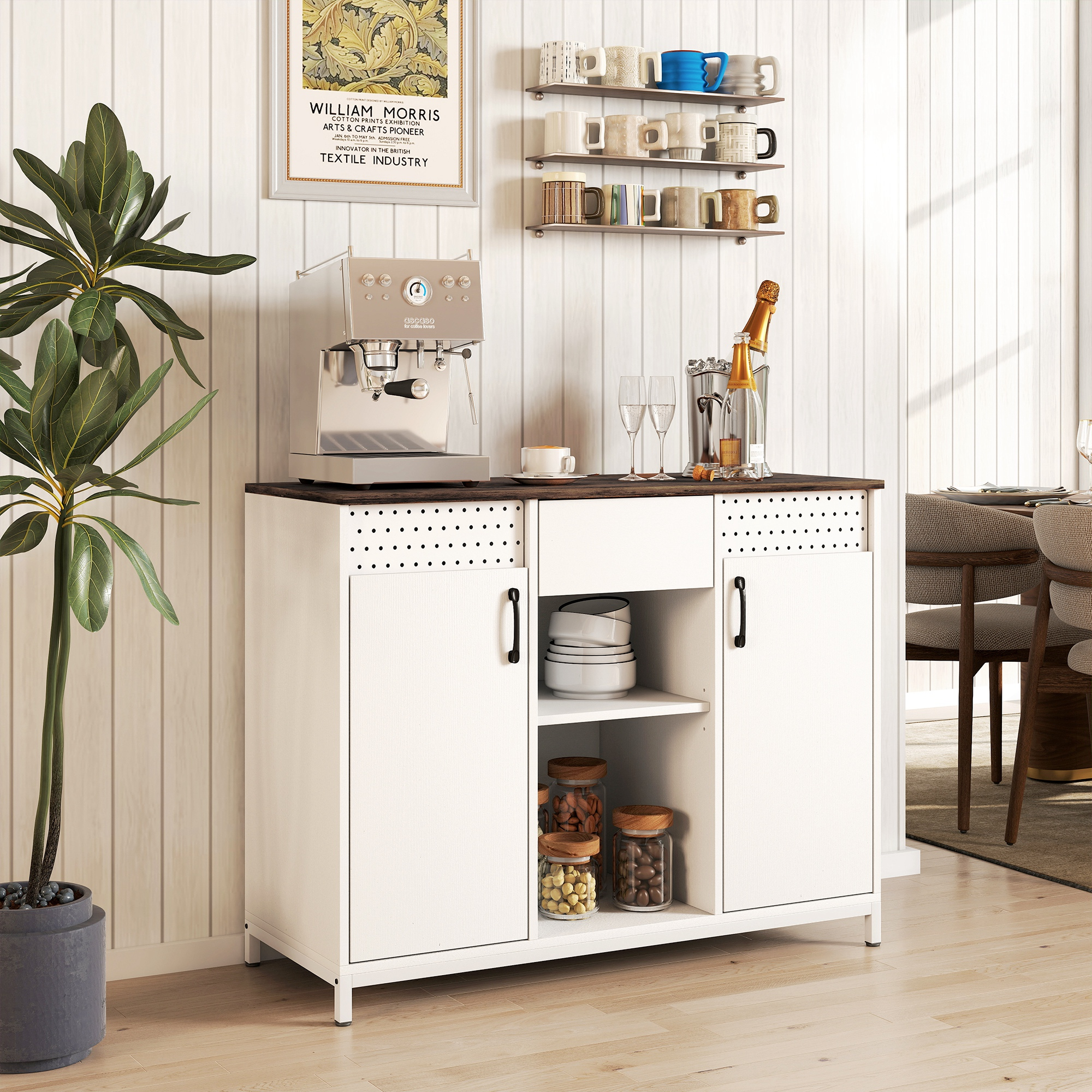 Un mueble blanco con cafetera, vasos, champán y una planta.