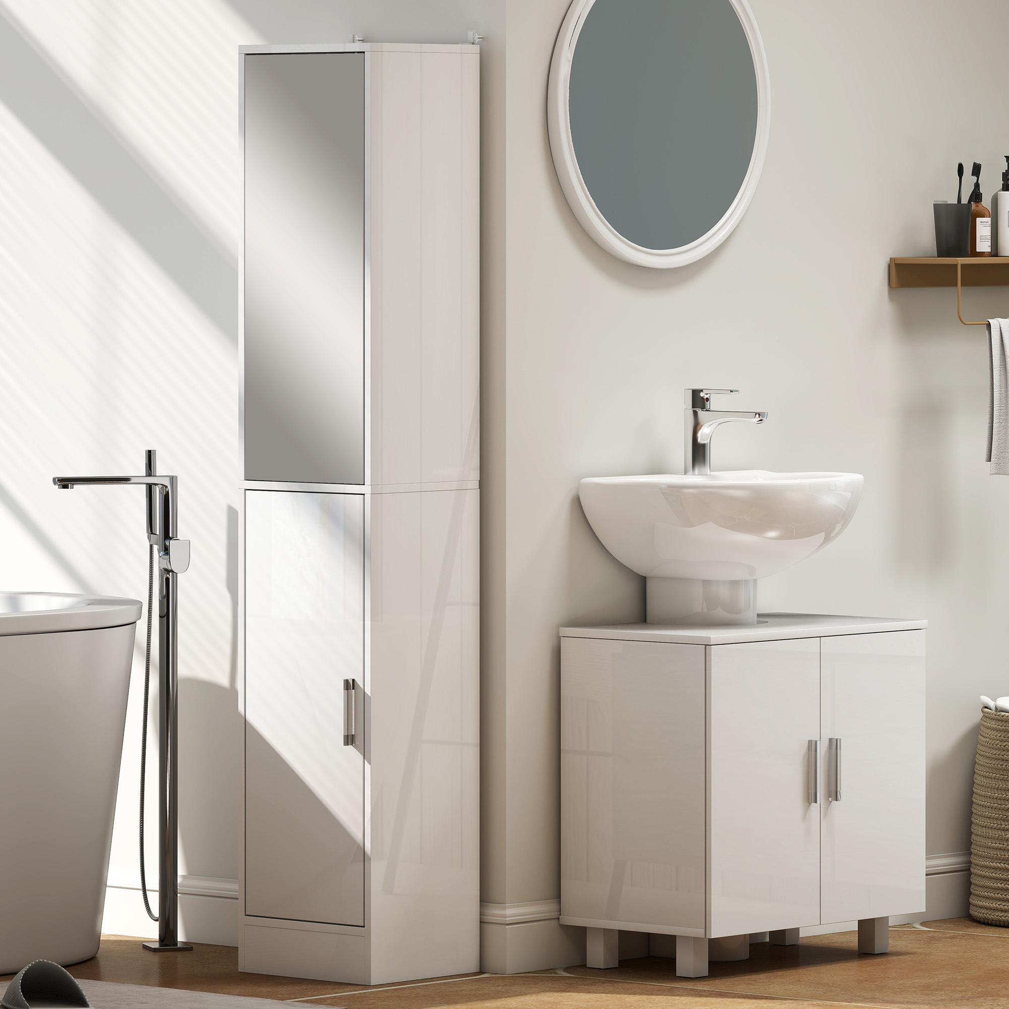 Baño moderno con tocador blanco, lavabo, mueble alto con espejo y bañera.
