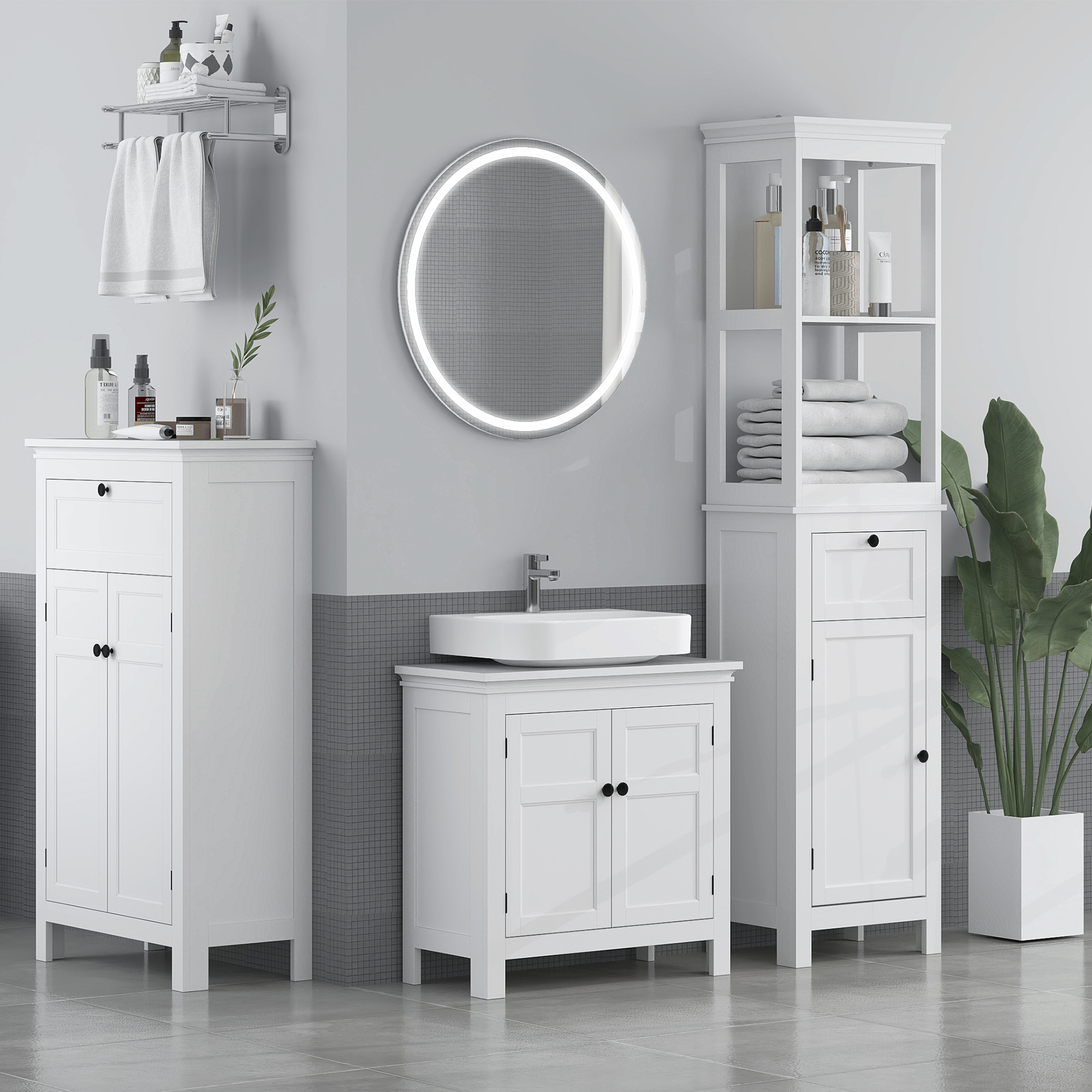 Un baño blanco con tocador, armarios, espejo y toallas.