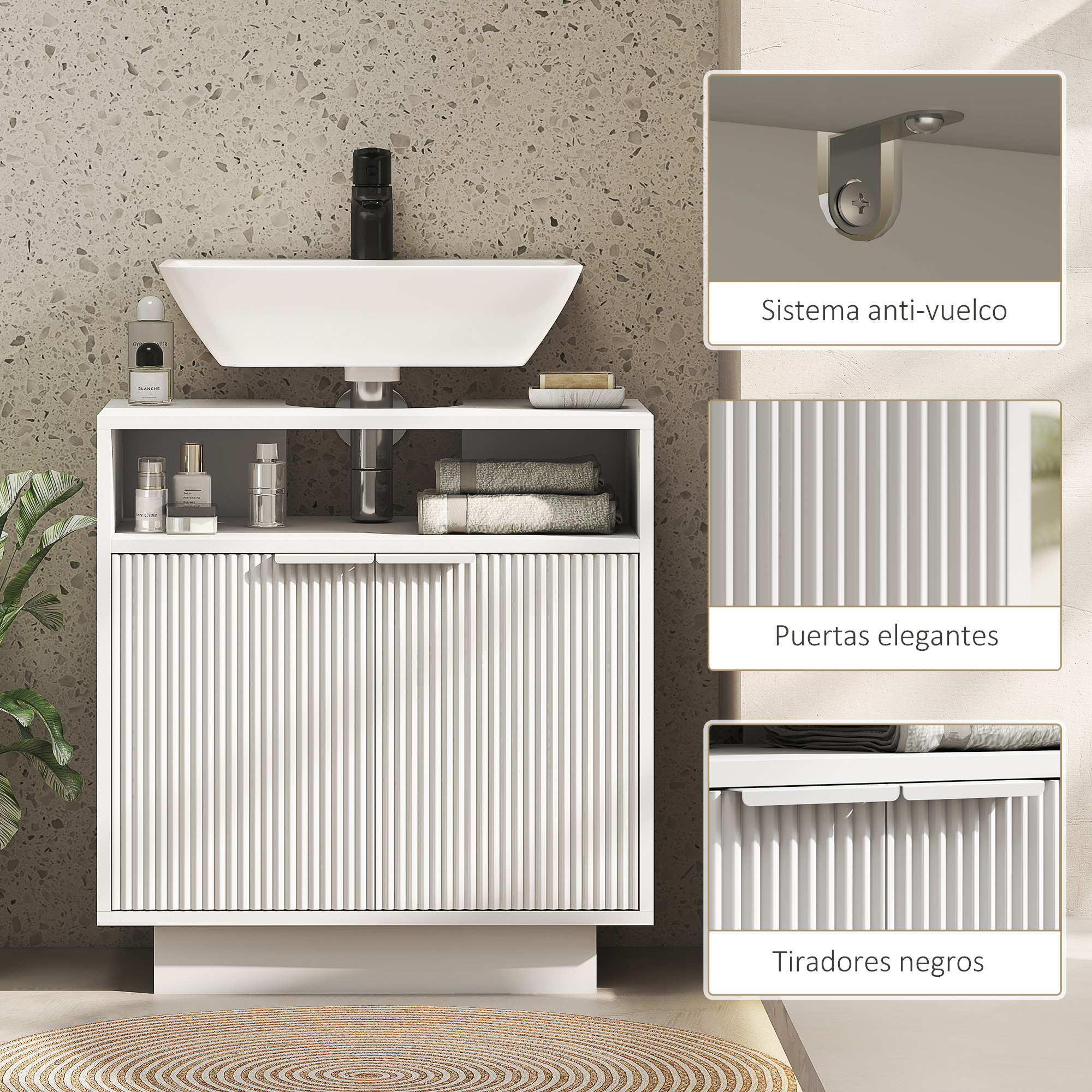 Un mueble de baño blanco con lavabo, grifo, espejo y planta.