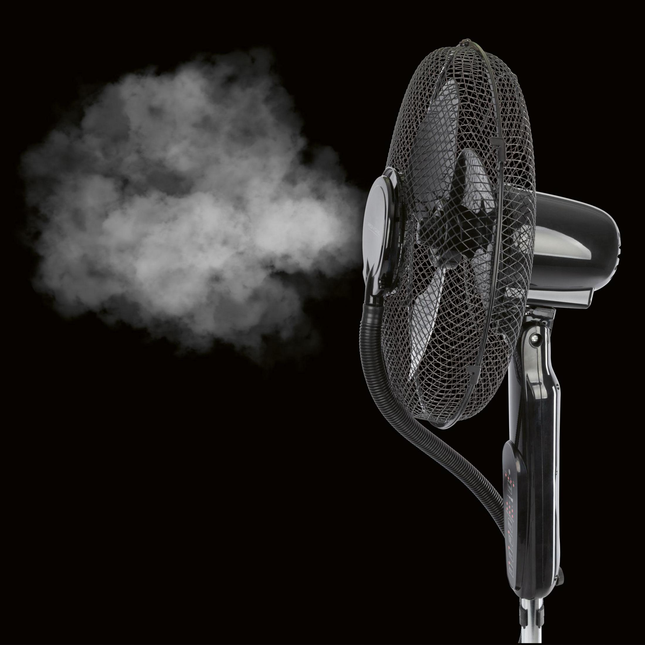 Czarny wentylator wydmuchuje białą mgłę.