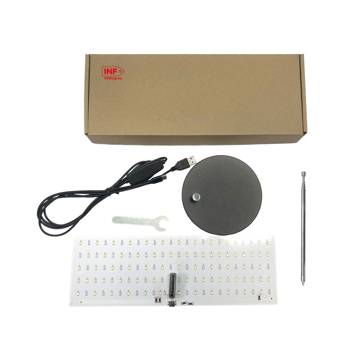Scatola di cartone, cavo USB, chiave inglese, base rotonda nera, antenna e circuito stampato con LED.