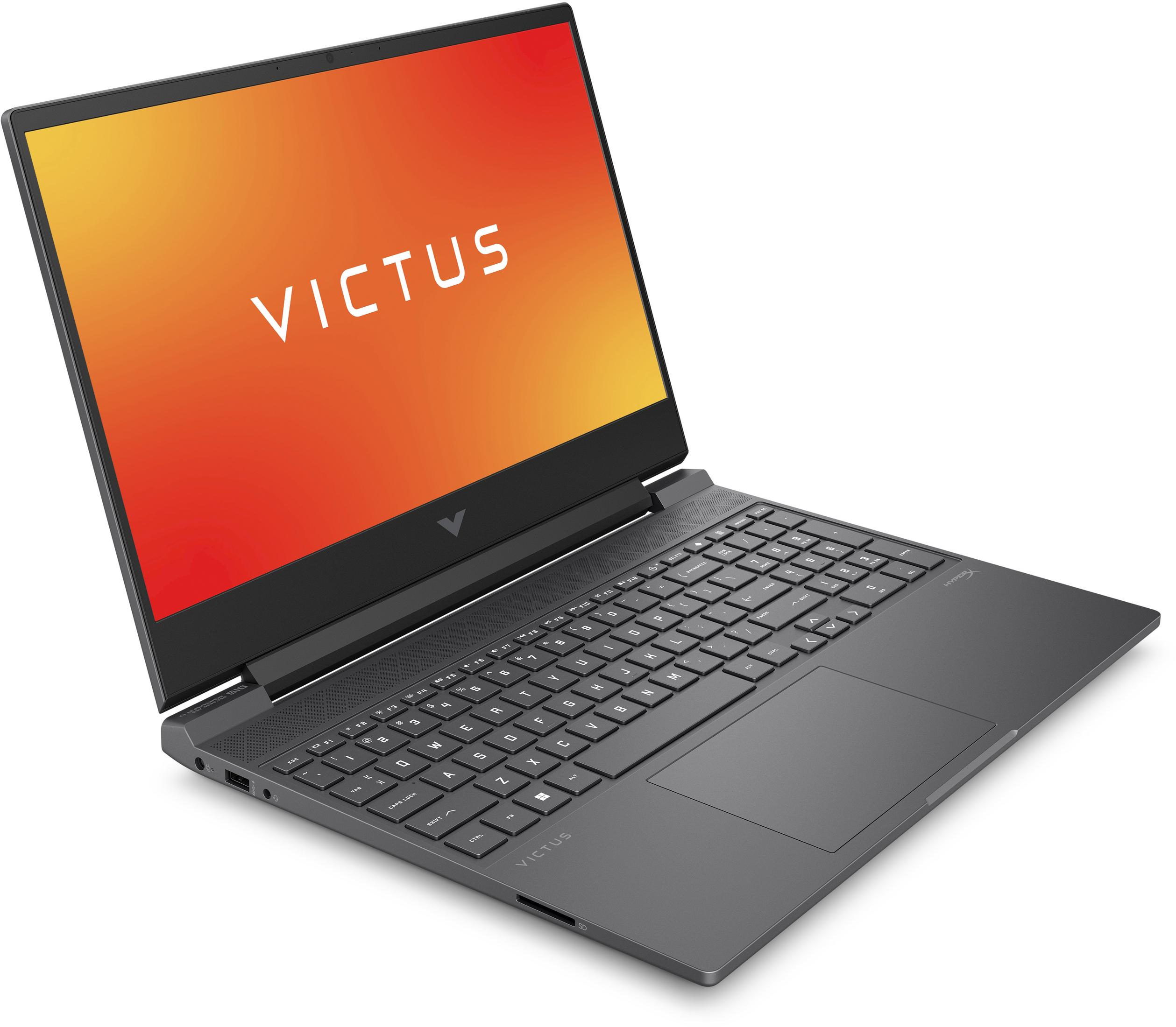 Otwarty szary laptop z logo VICTUS na ekranie.