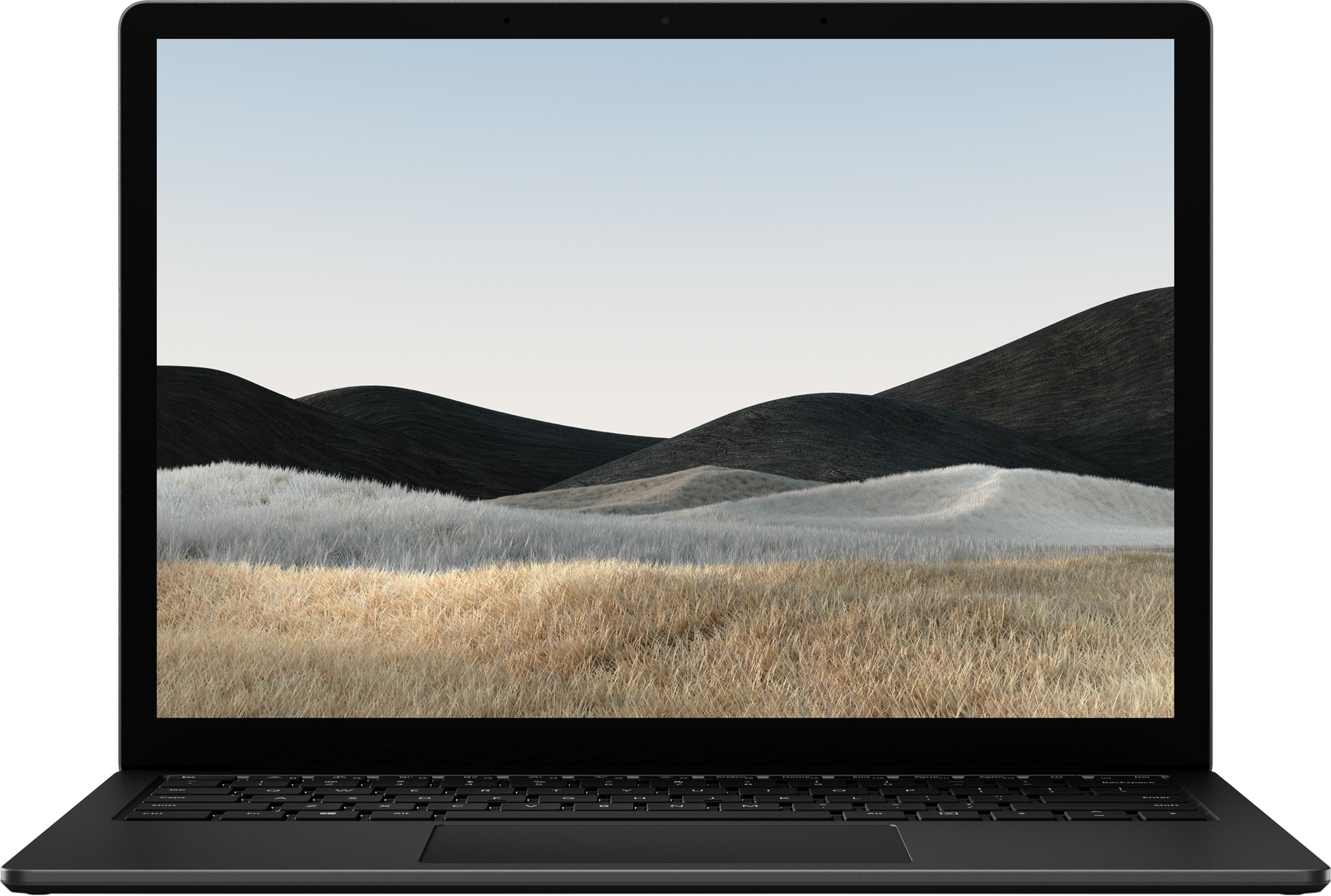 Ein dunkler Laptop zeigt eine ruhige Landschaft mit sanften Hügeln und trockenem Gras.