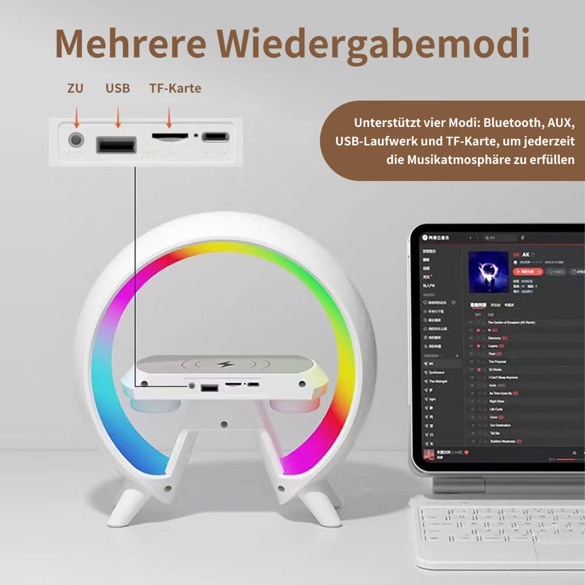 Ein weißer Lautsprecher mit Regenbogen-LEDs, neben einem Tablet mit Musikplayer-App.