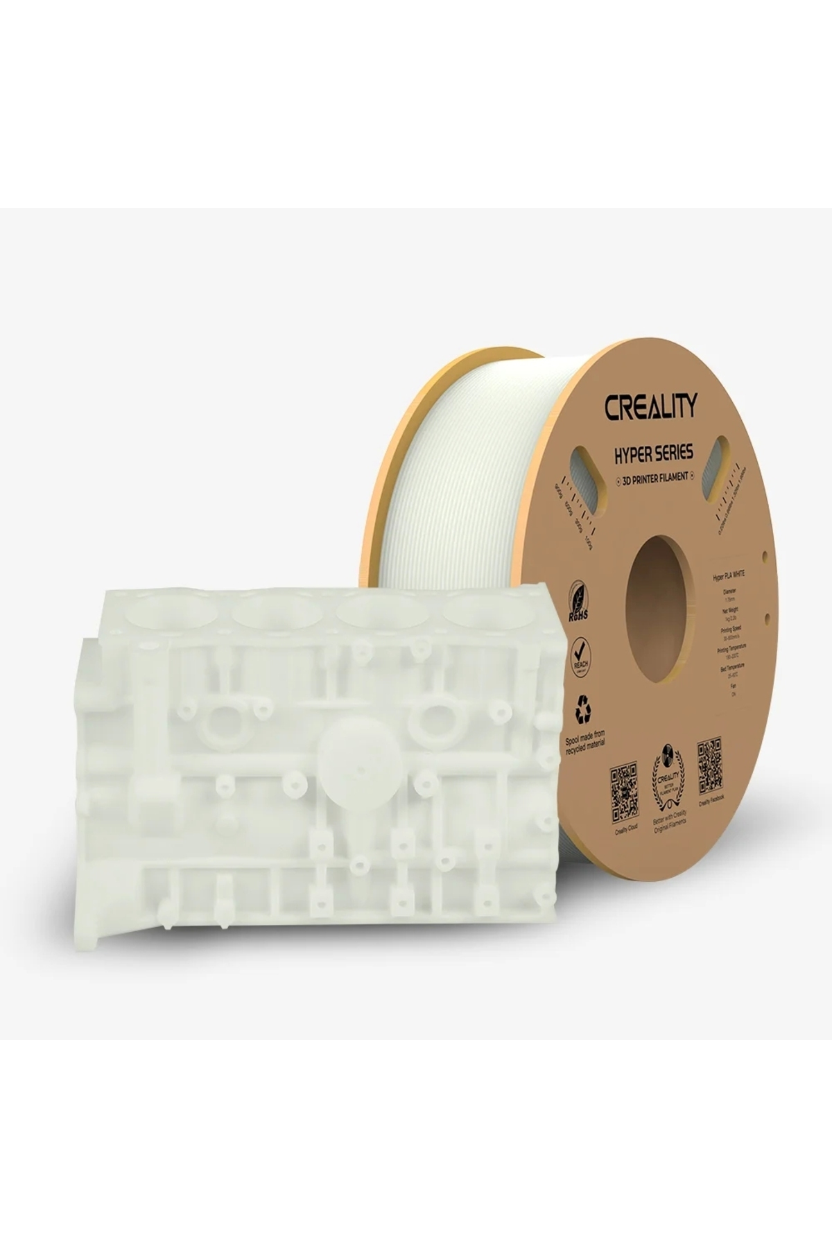 Una bobina di filamento bianco per stampante 3D e un blocco motore bianco.