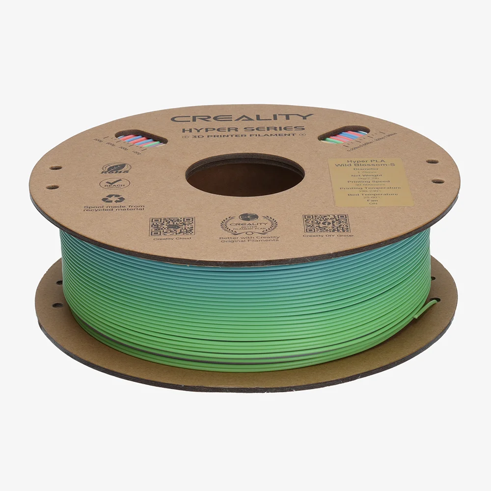 Un rocchetto di filamento per stampante 3D Creality in gradiente blu-verde.