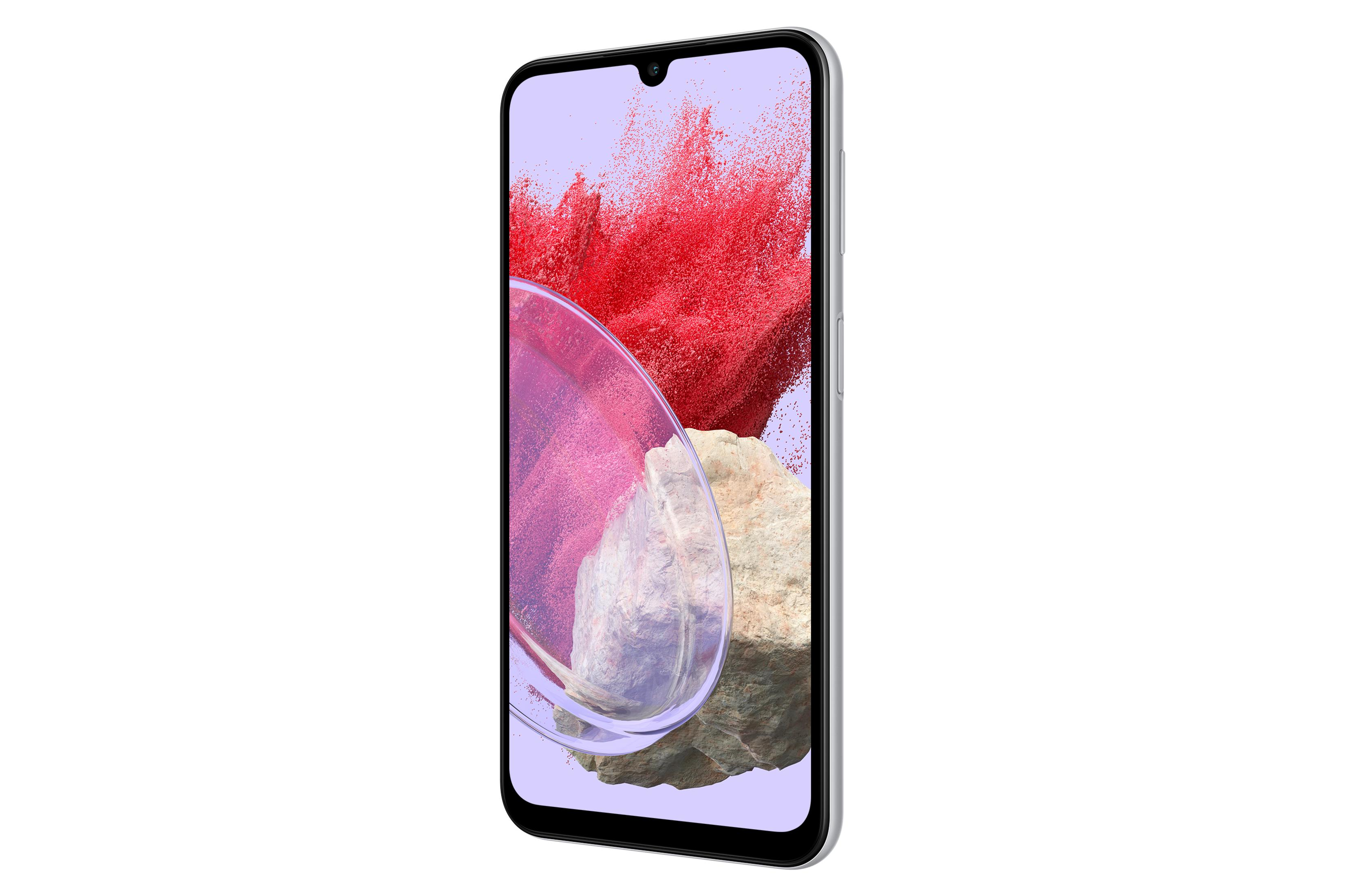 Canlı kırmızı renk patlaması arka planına sahip gümüş akıllı telefon.