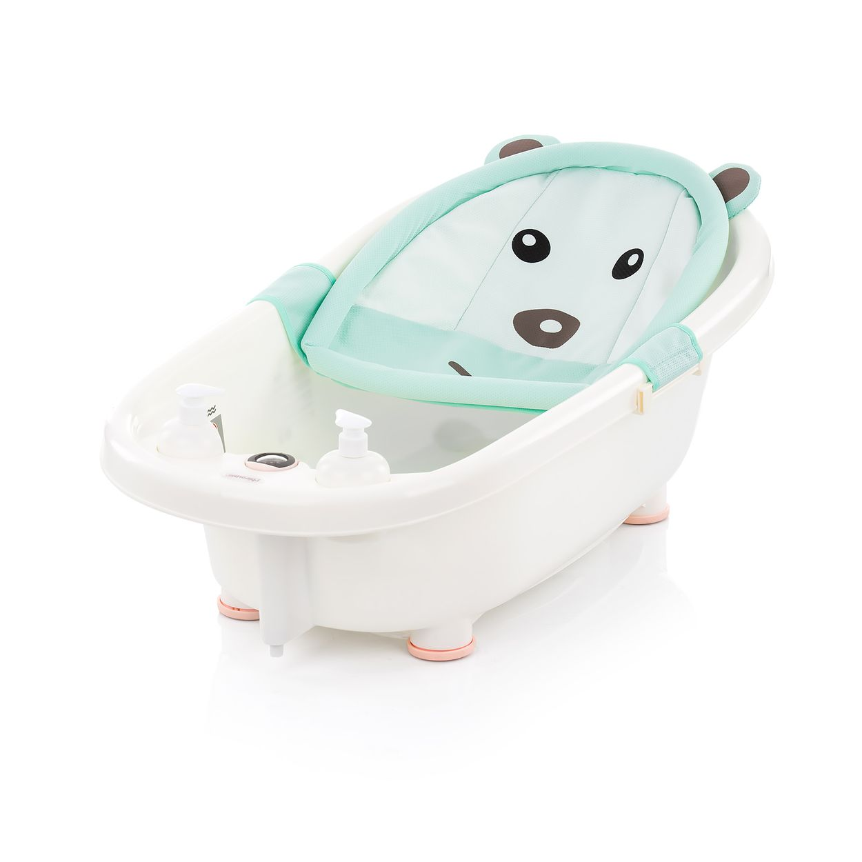 Ein weißes Babybadewannen-Set mit mintgrünem Bären-Badeinleger und zwei Seifenspendern.