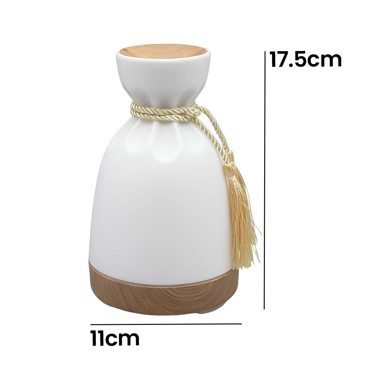 Lampada bianca con coperchio in legno e nappa, alta 17,5 cm, larga 11 cm.
