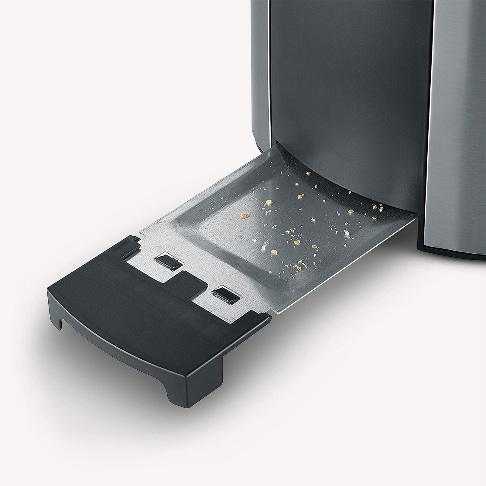 Wysuwana tacka na okruchy z tostera z okruchami.