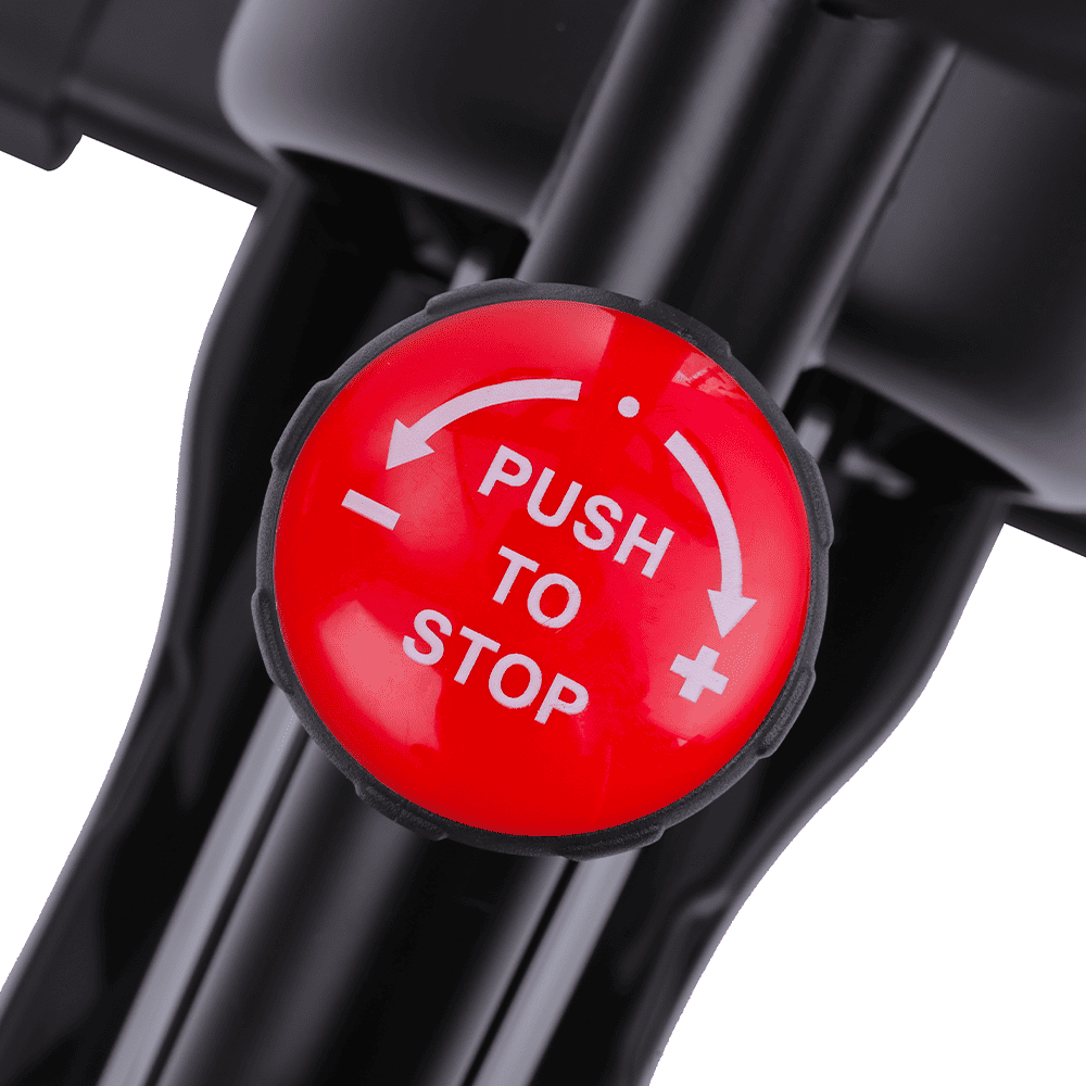 Un botón rojo con la etiqueta "PUSH TO STOP" y flechas.