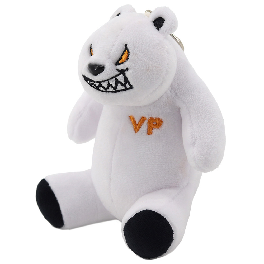 Ein weißer Plüschbär-Schlüsselanhänger mit bösem Gesicht und orangenem "VP"-Logo.