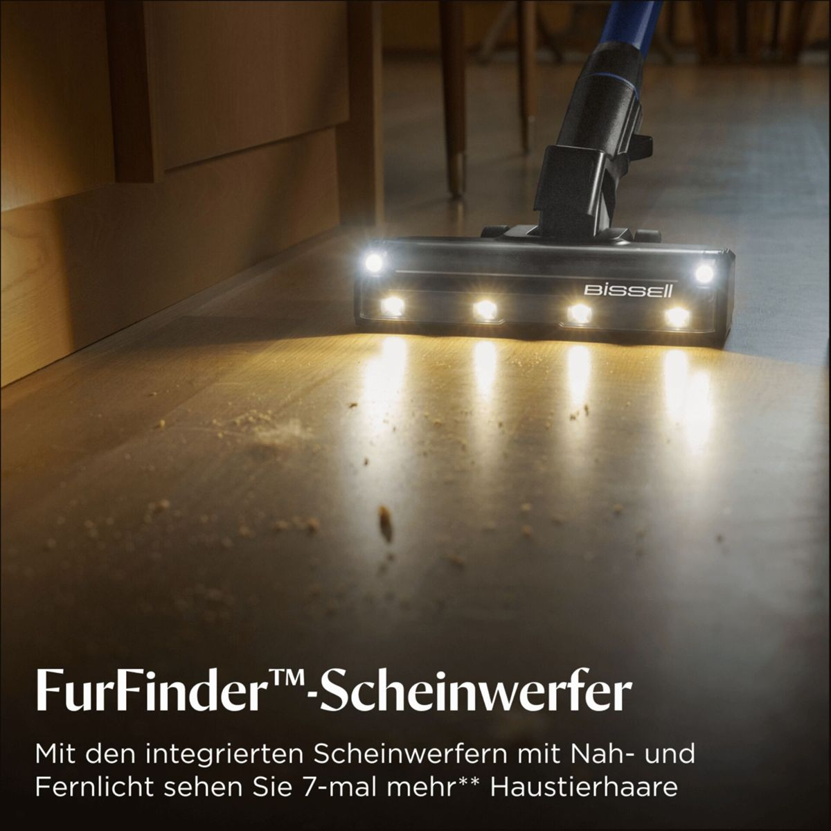 Aspirapolvere Bissell con luci pulisce pavimento in legno da detriti.