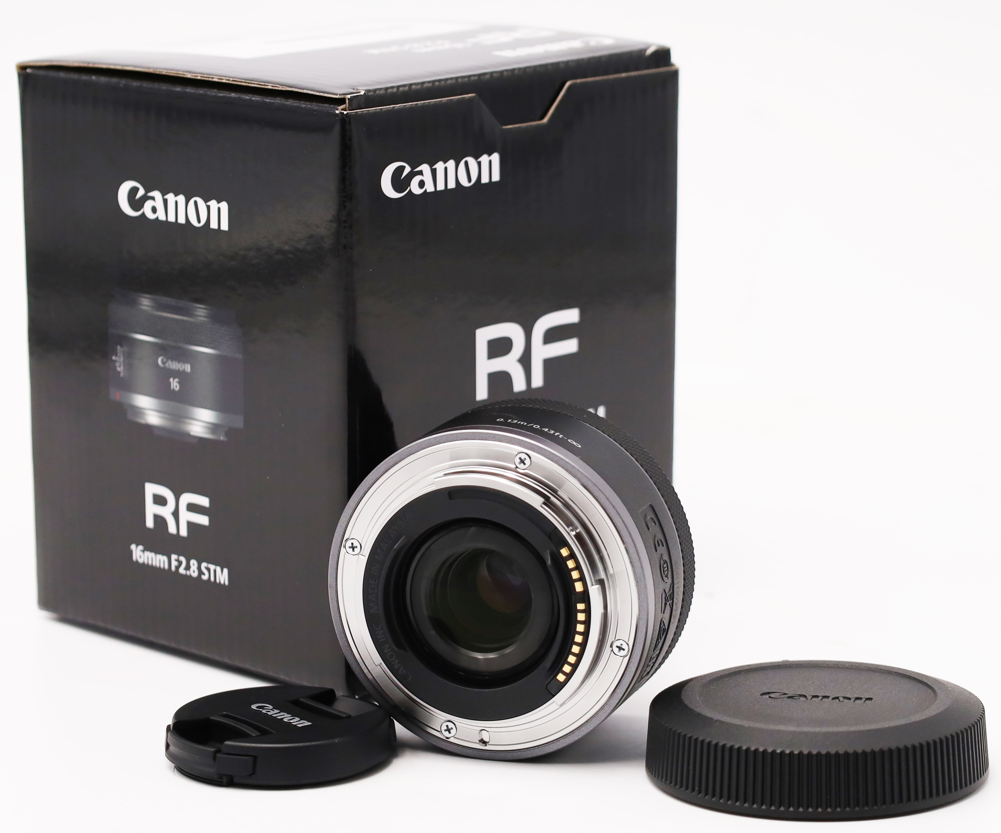 Canon RF 16mm F2.8 STM lens with box and lens caps.