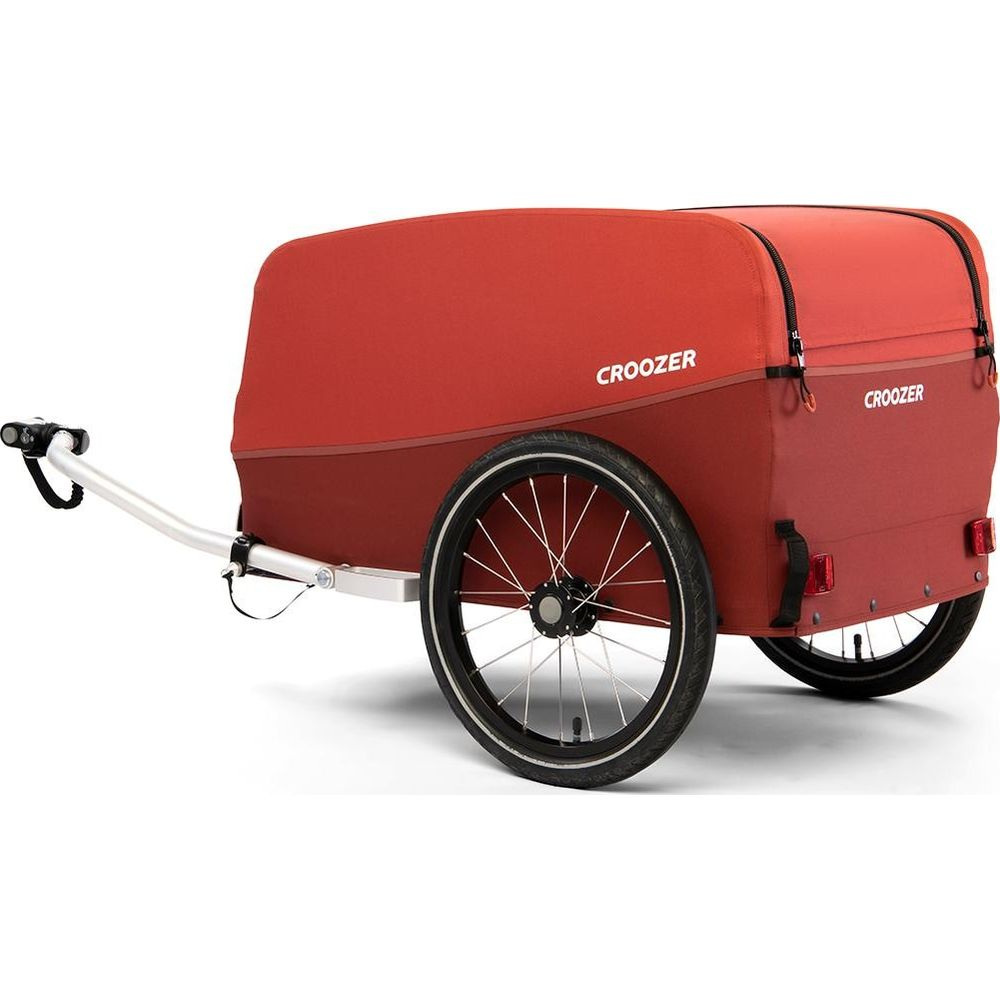 Ein roter Croozer Fahrradanhänger mit zwei Rädern und einer Deichsel.