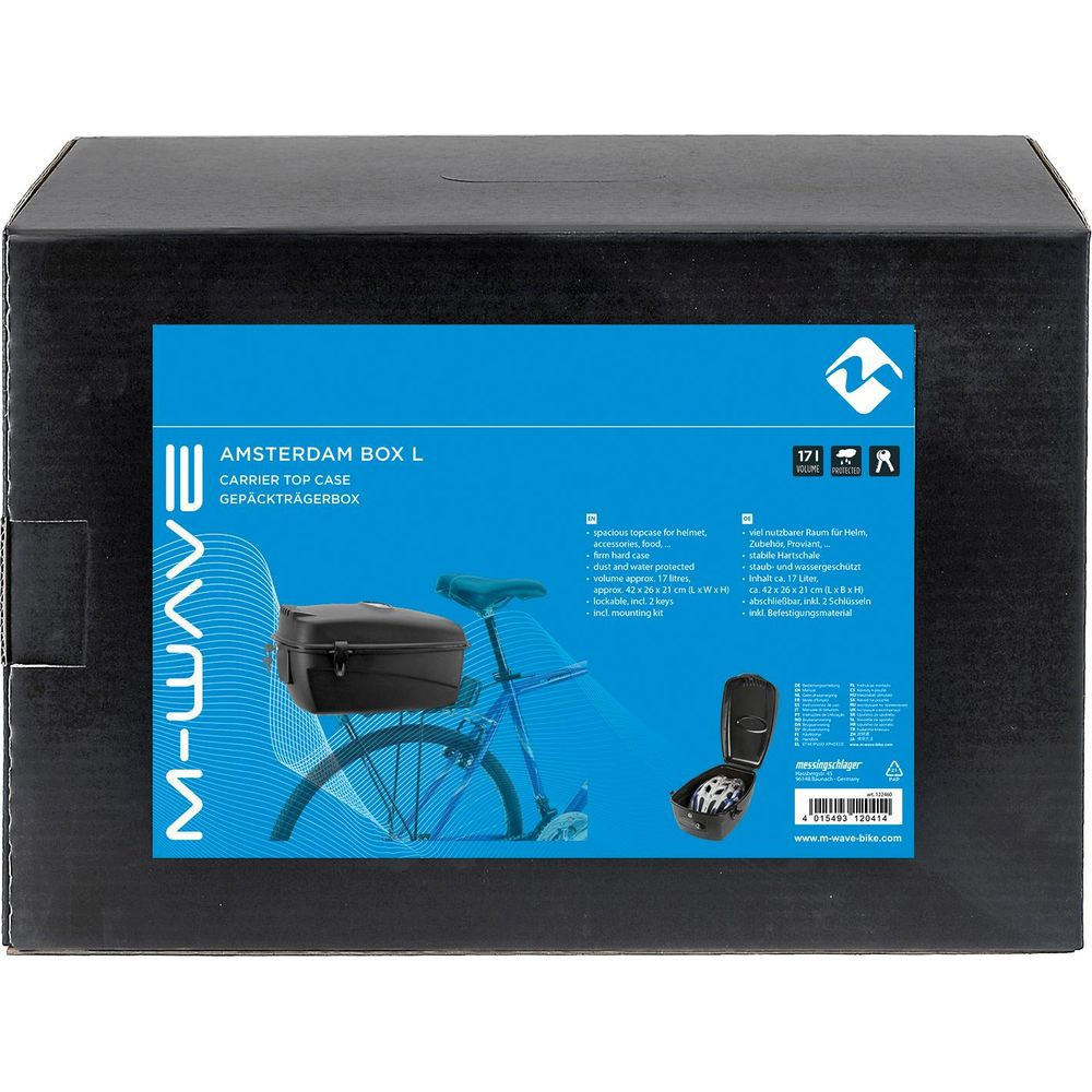 Schwarze Box mit Fahrradtopcase und Fahrrad im Hintergrund.