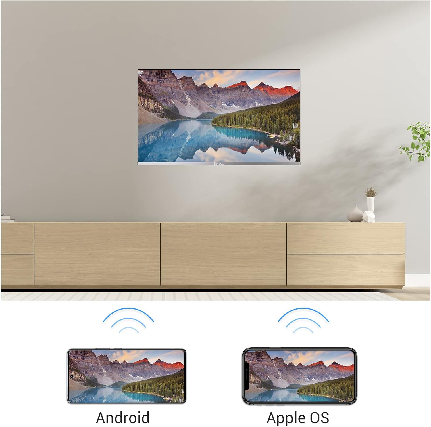 Ein großer Fernseher zeigt Berglandschaft. Darunter sind zwei Smartphones.