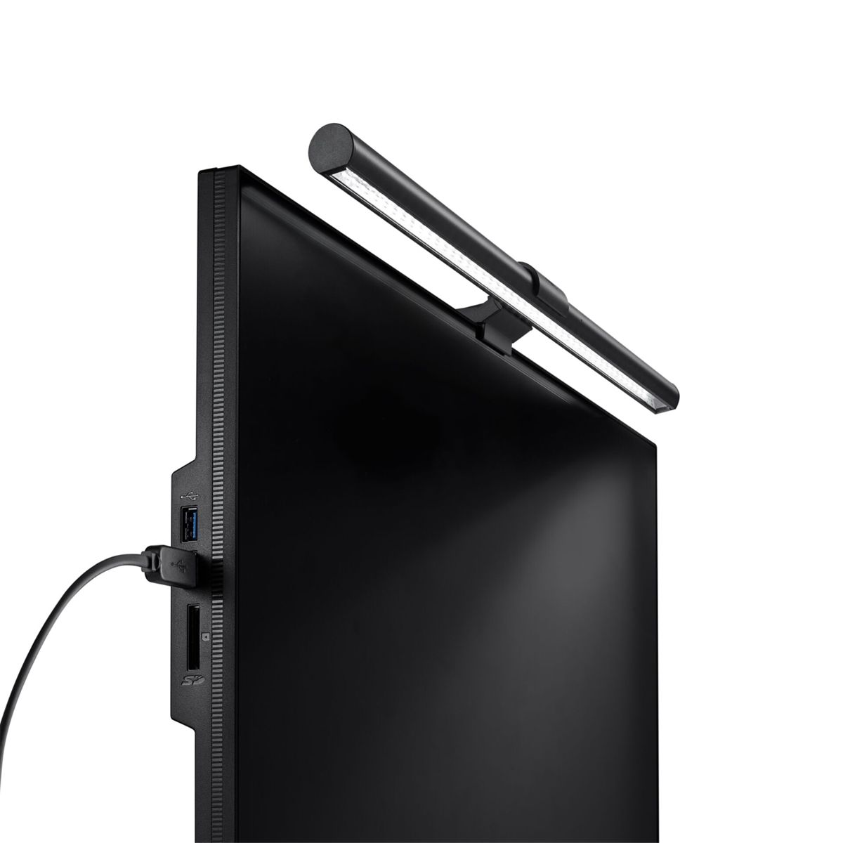 A black monitor with an LED lamp on top and a USB cable attached.