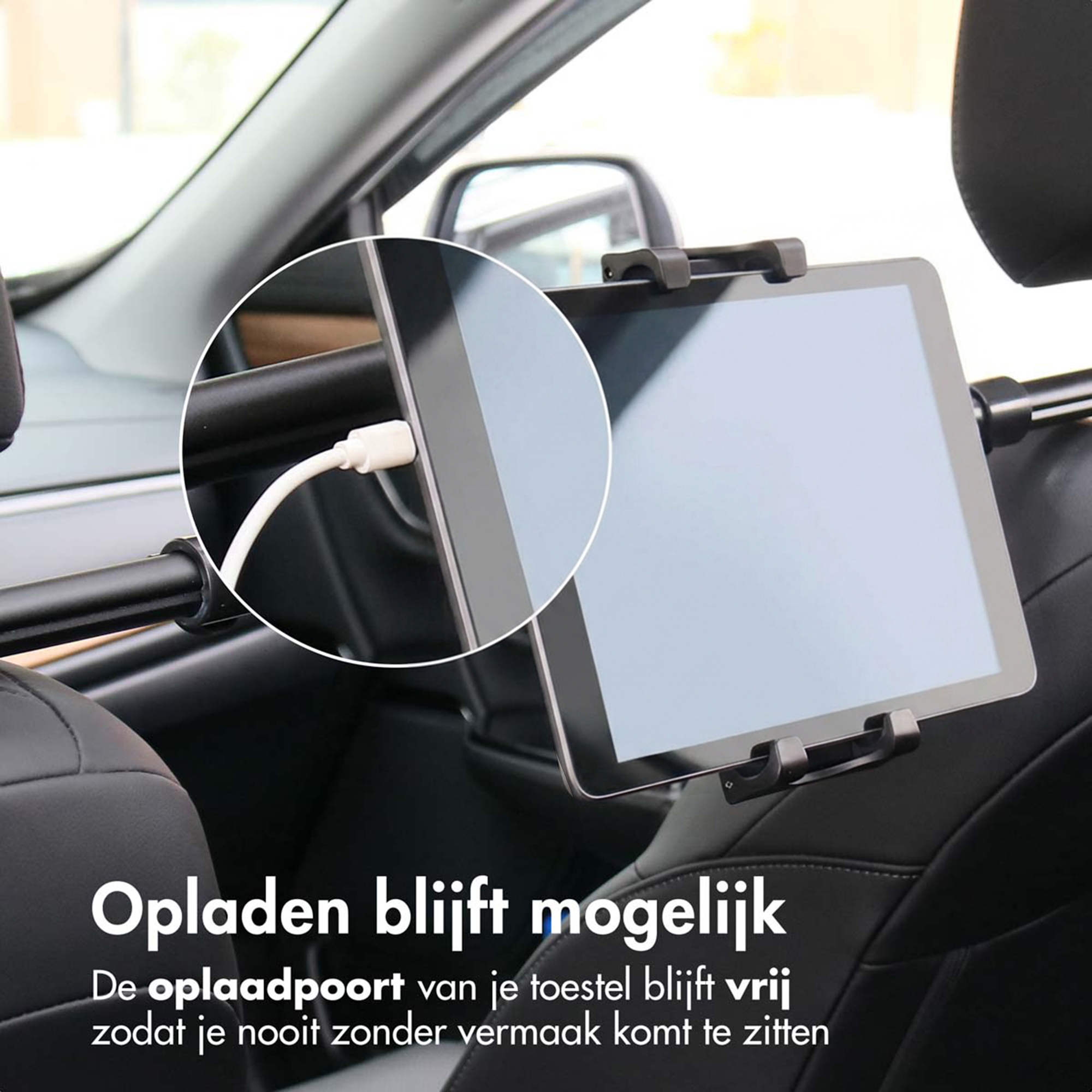 Een tablet is bevestigd aan een autostoel, met een oplaadkabel.