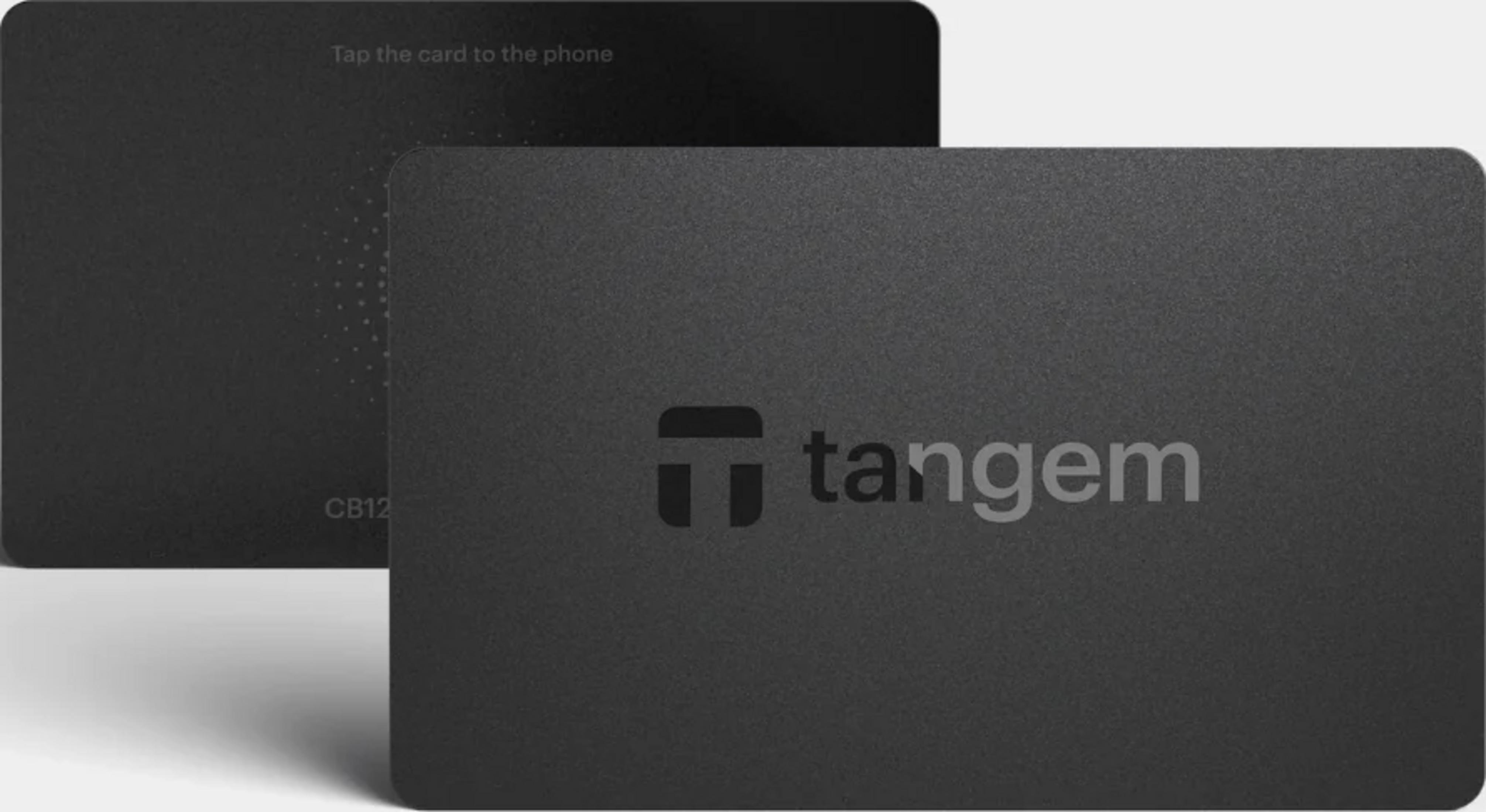 Dwie czarne karty z logo Tangem. Jedna karta ma wzór w kropki.