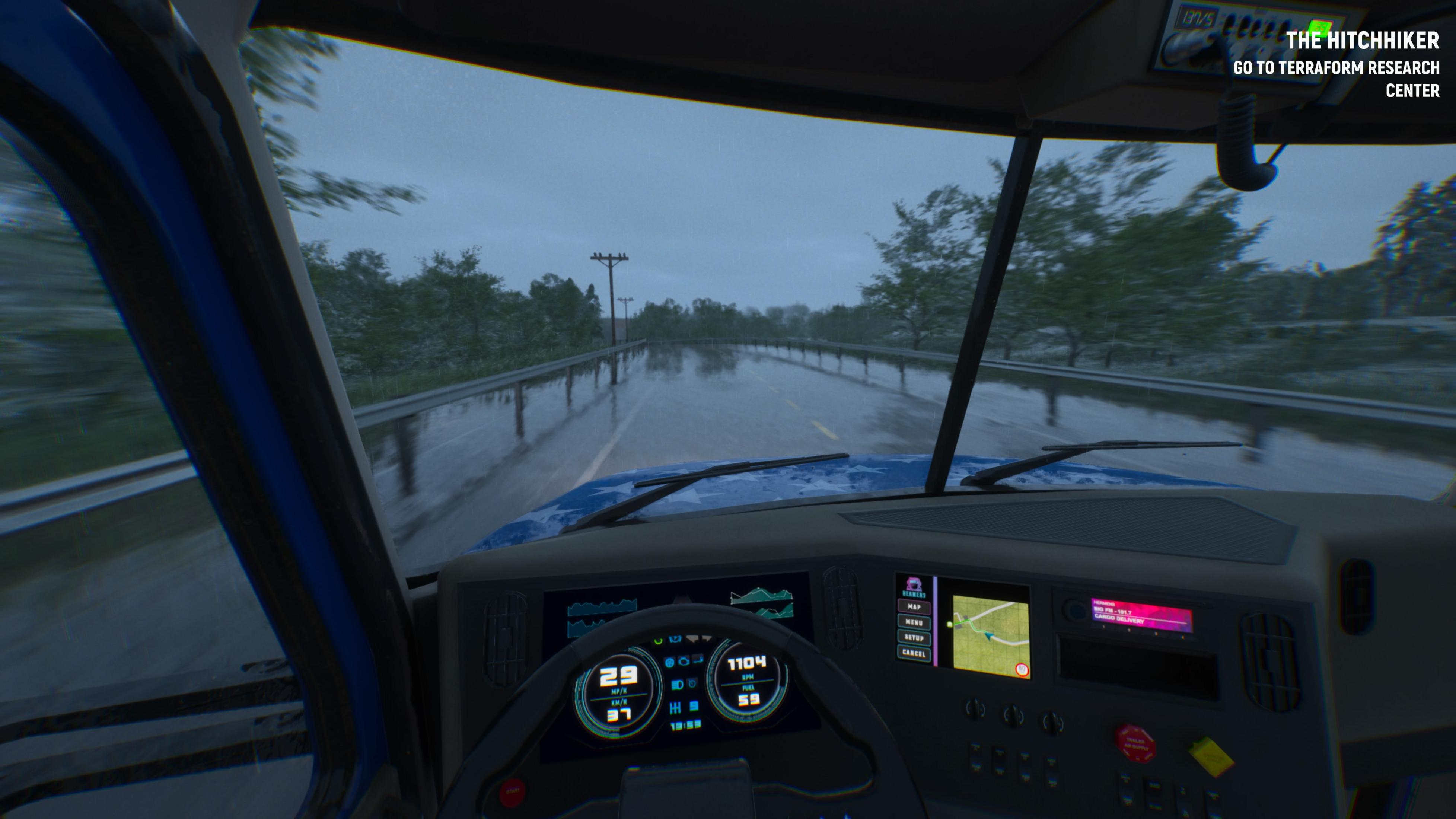 Blick aus der Fahrerkabine auf eine nasse Straße bei Regen. Digitale Anzeigen im LKW.