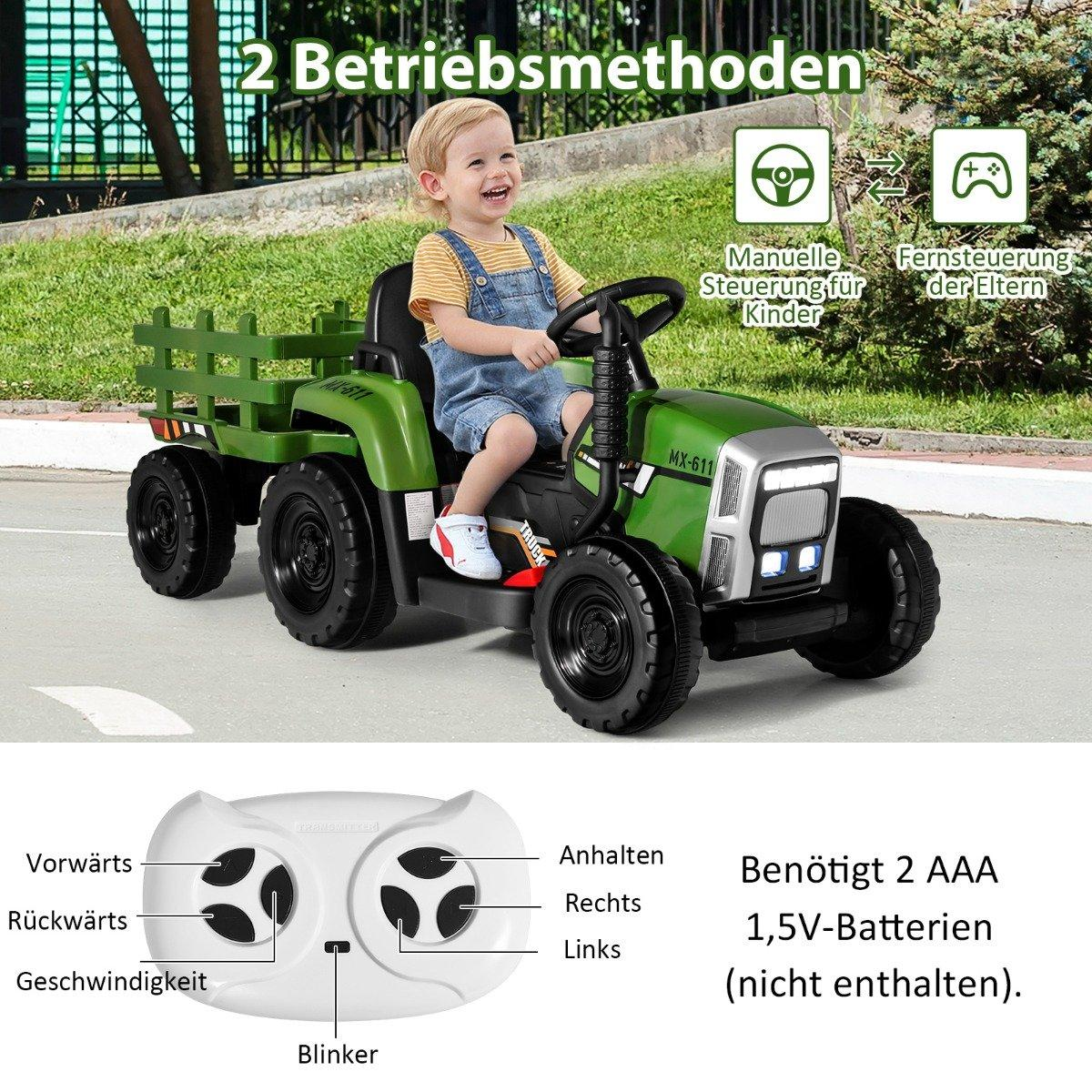 Green toy tractor with trailer, a smiling child is seated on it.