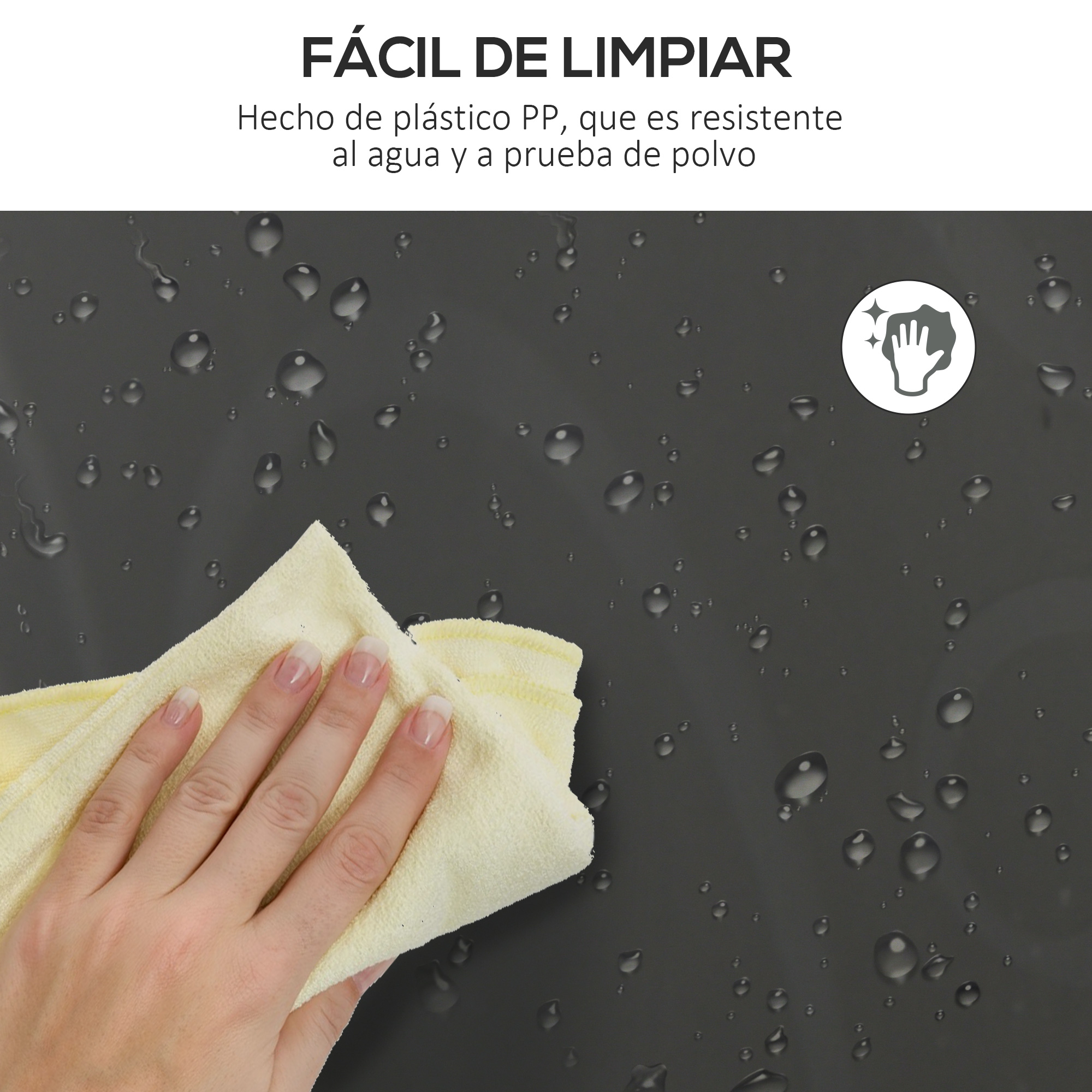 Una mano limpia una superficie oscura con gotas de agua con un paño amarillo.