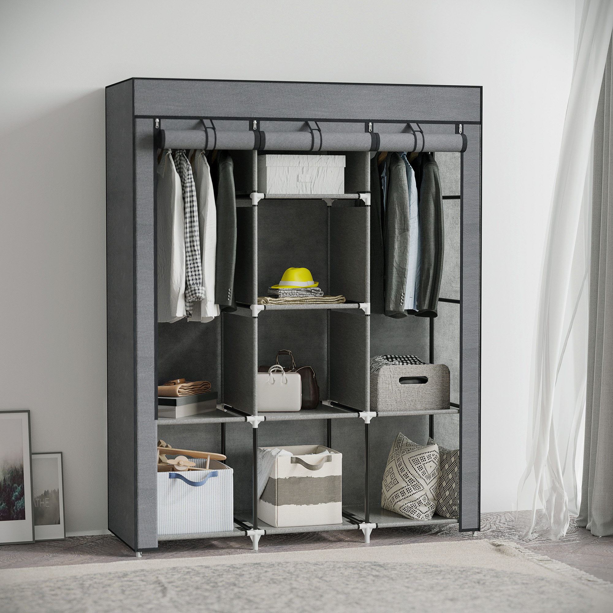 Un armario de tela gris con ropa, cajas y accesorios.