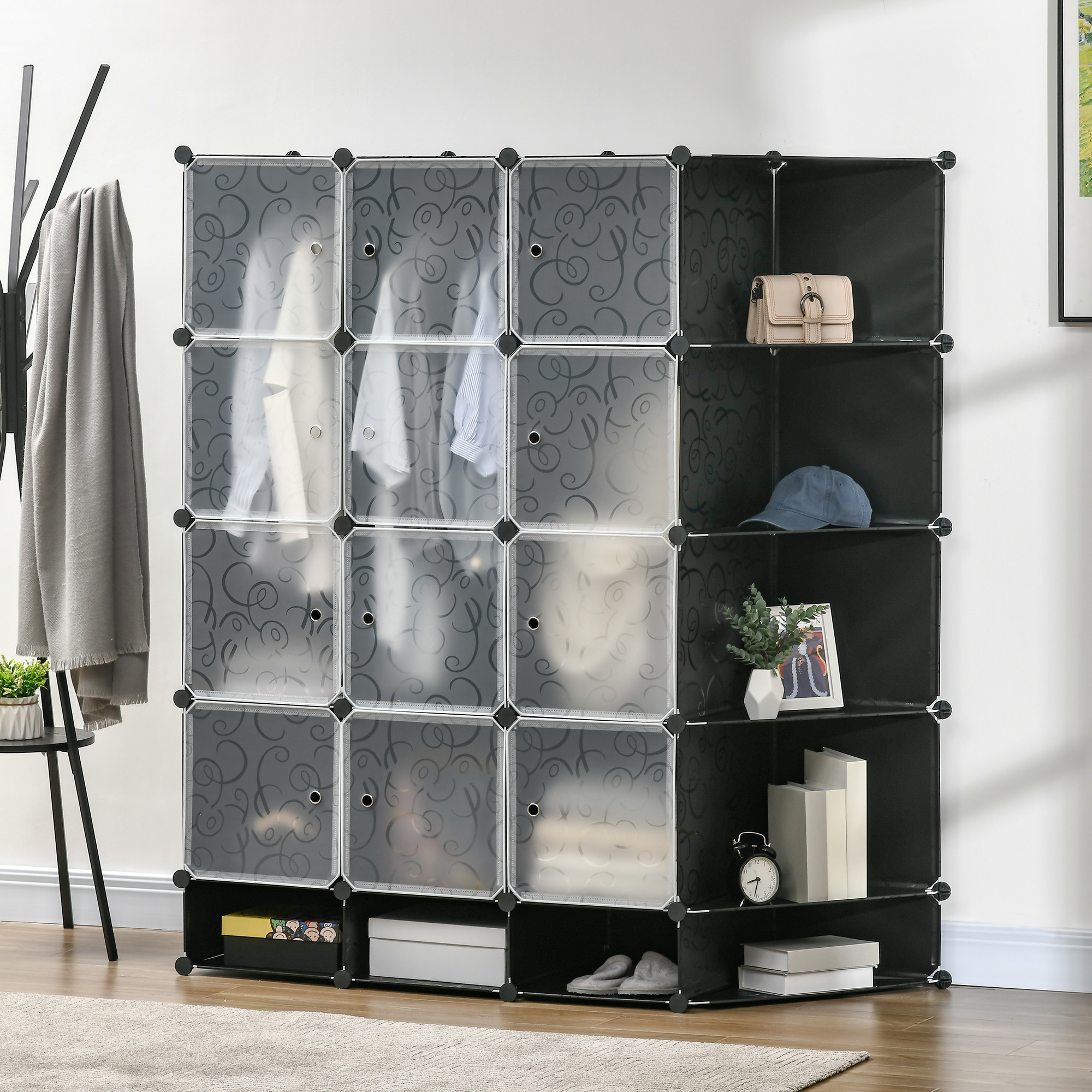 Armario modular negro con puertas estampadas, ropa, bolso, sombrero, reloj, libros.