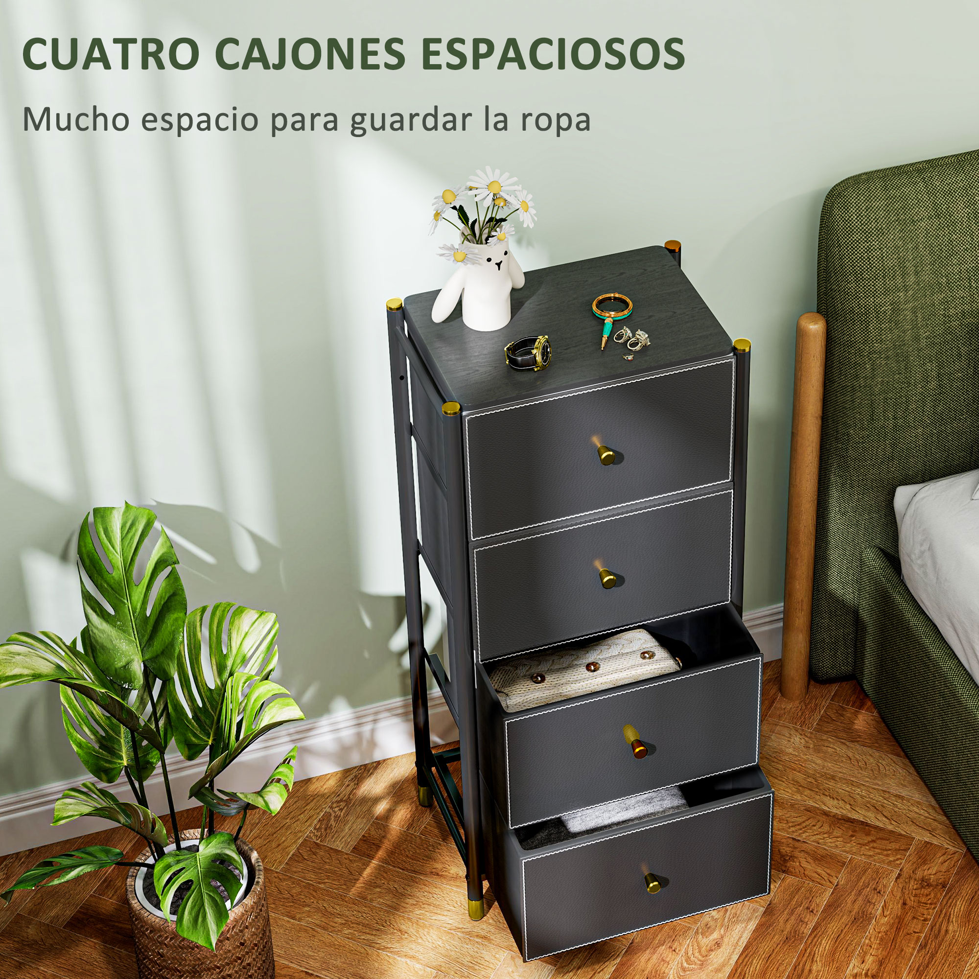 Una cómoda de almacenamiento negra de cuatro cajones junto a una cama tapizada.