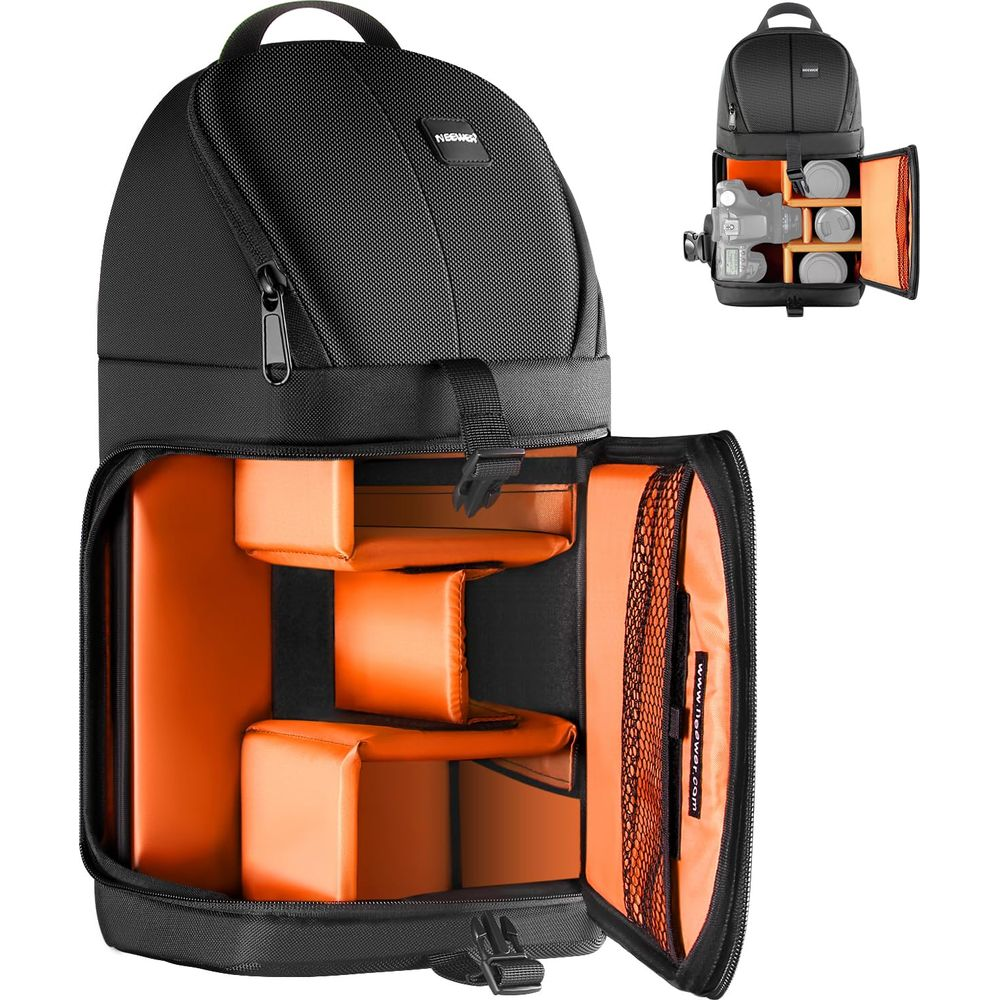 Zwarte cameratas met oranje interieur en vakken.