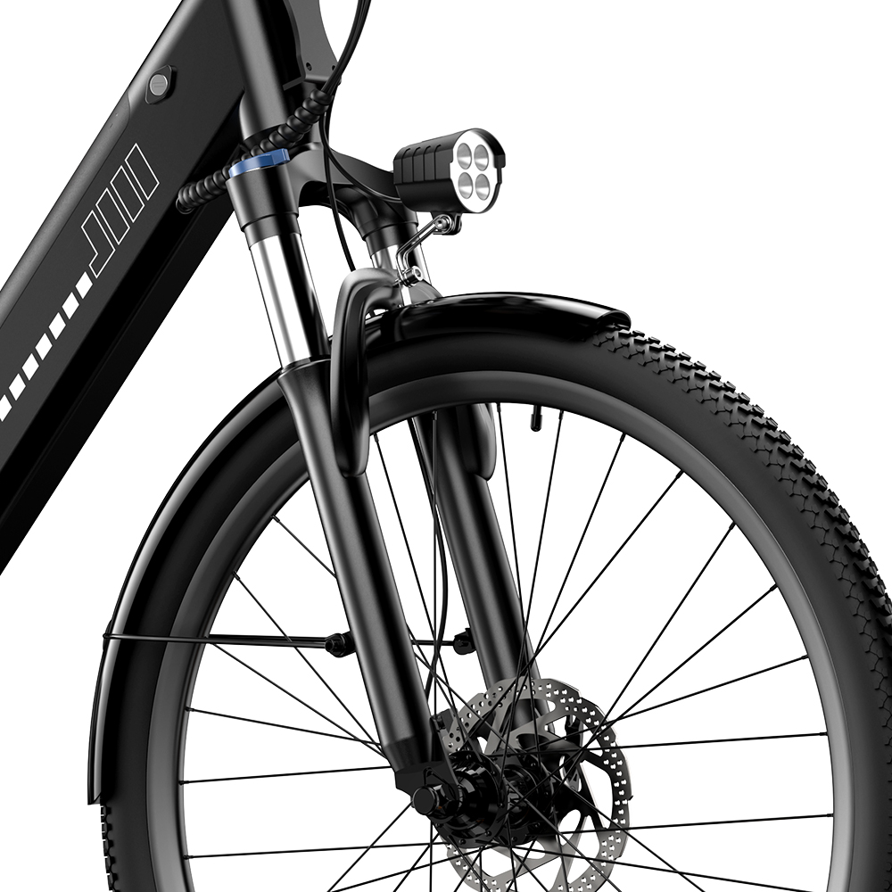 Vorderseite eines schwarzen Fahrrads mit breitem Reifen, Federgabel und LED-Scheinwerfer.