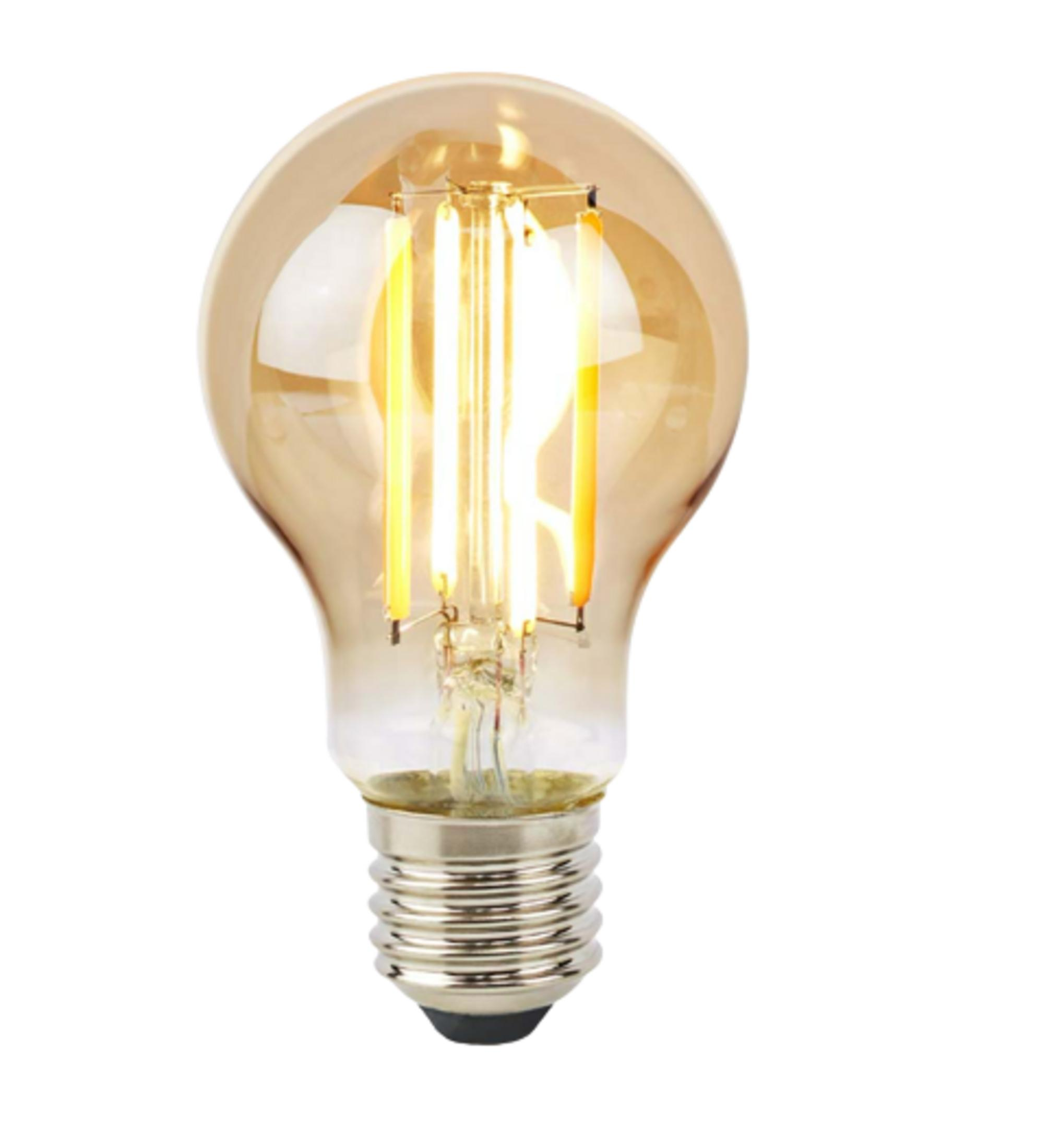 Bursztynowa żarówka z widocznymi nićmi LED i srebrną metalową podstawą.