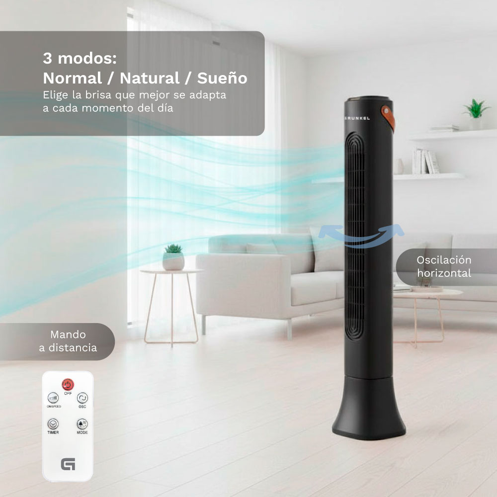 Un ventilador de torre negro con control remoto en una sala.
