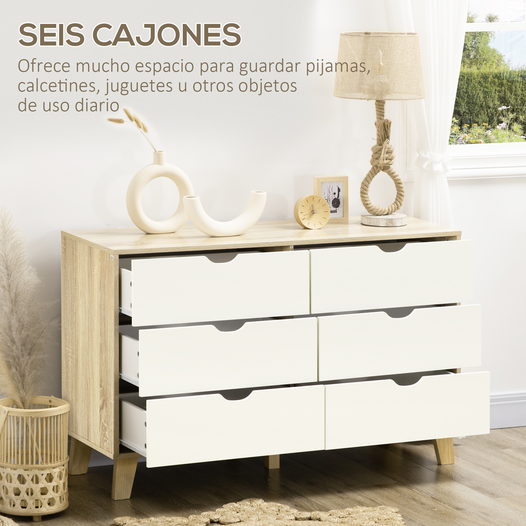Cómoda de seis cajones blancos con patas de madera.