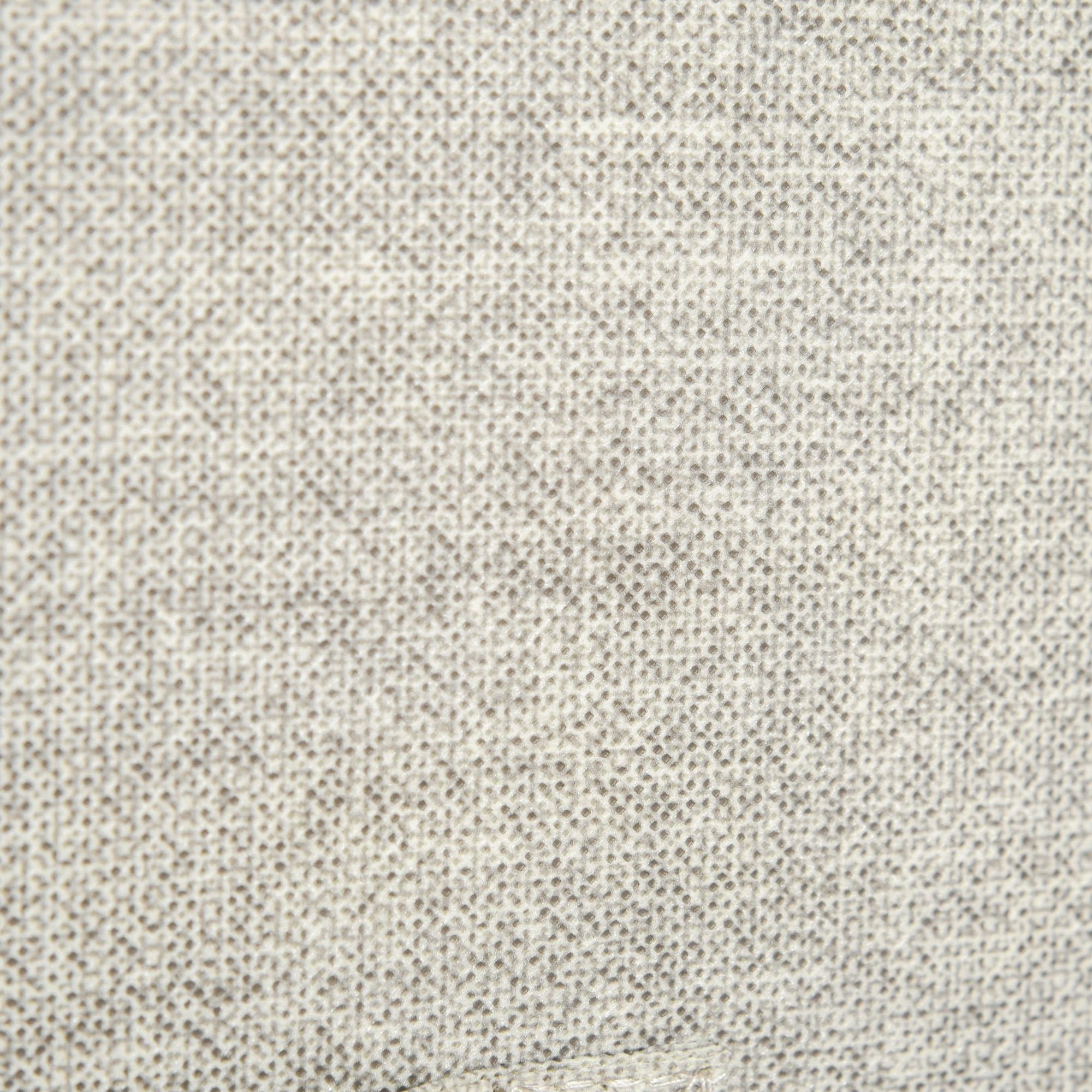 Textura gruesa con pequeños puntos oscuros sobre fondo claro.