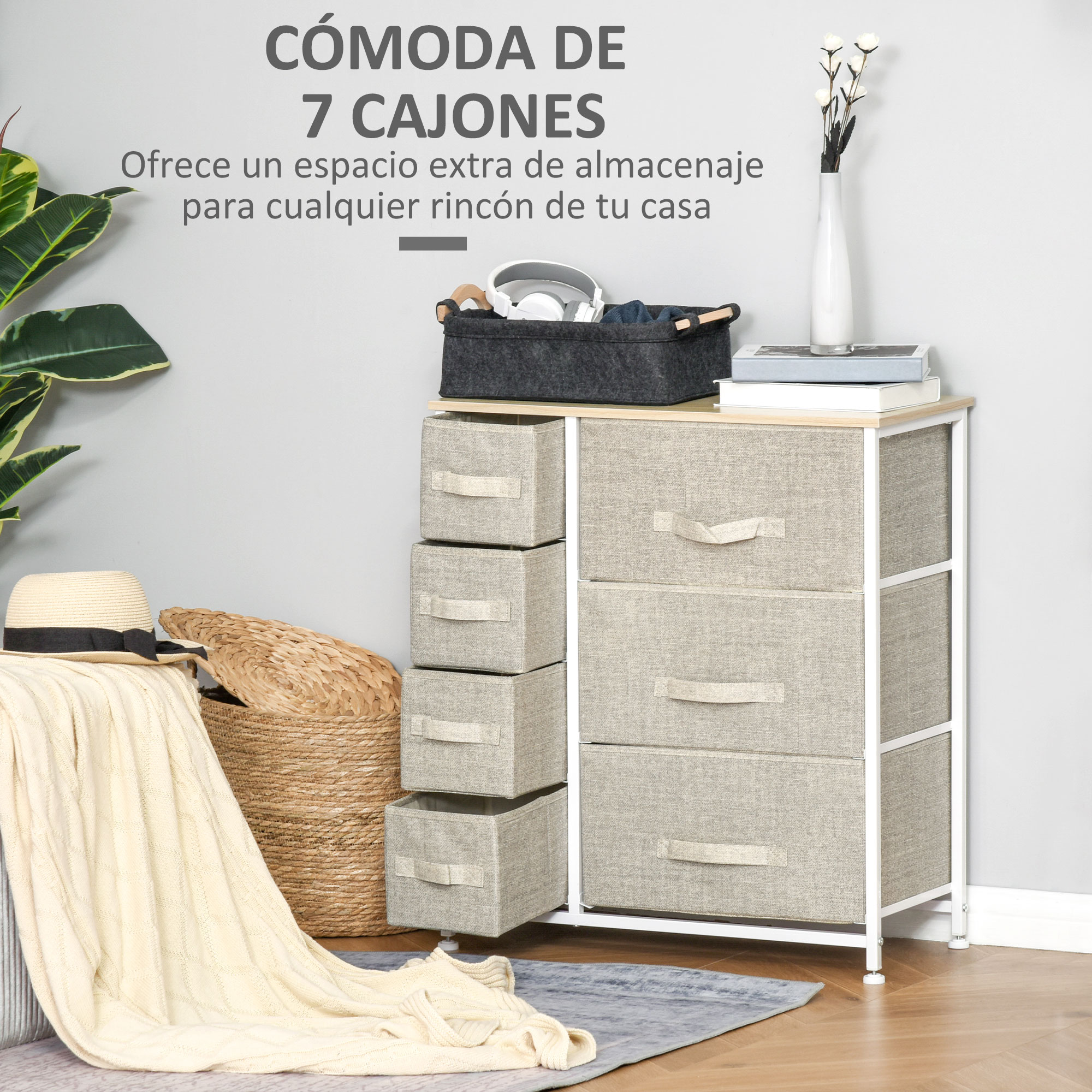 Cómoda de 7 cajones con cesta, manta y planta cerca.