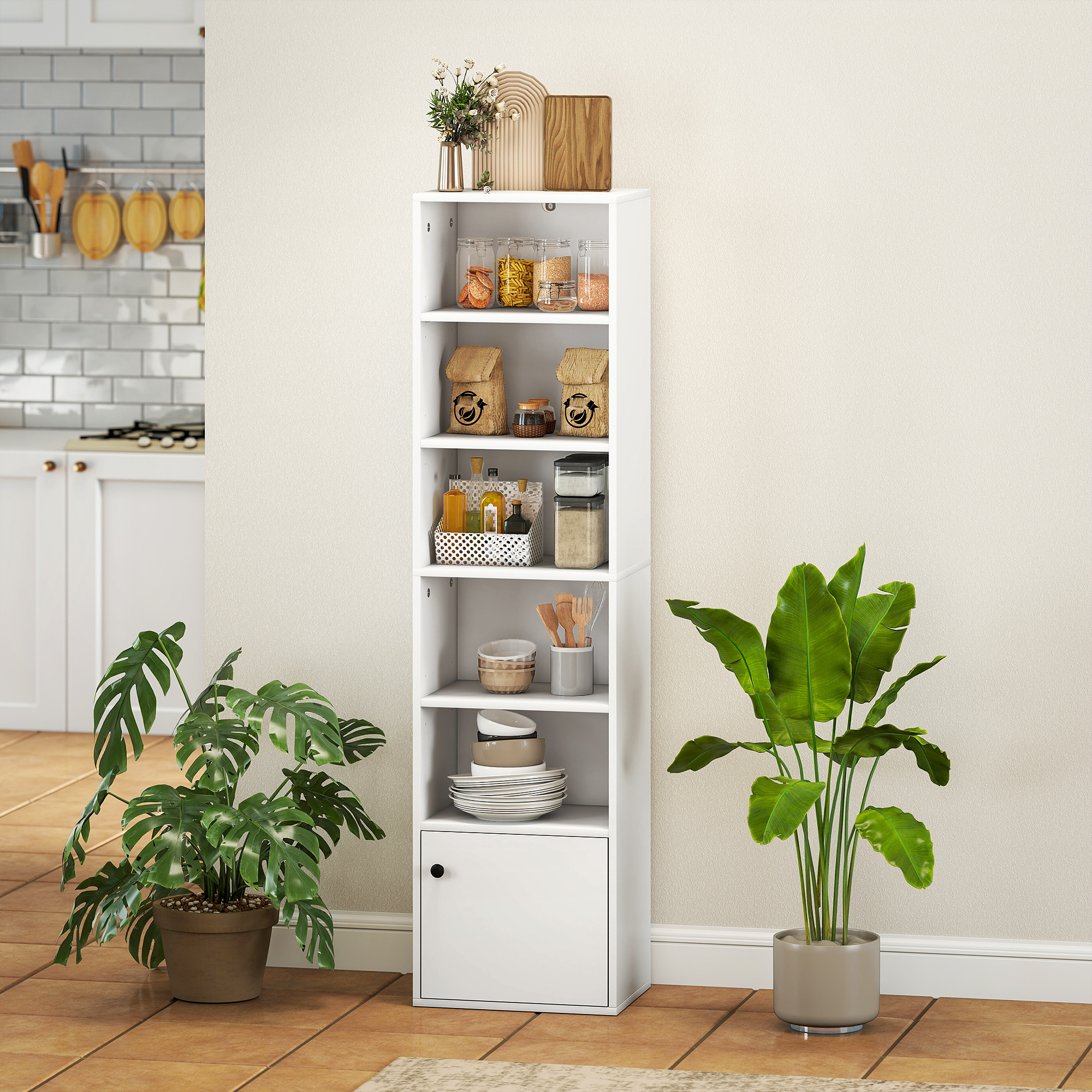 Un estante blanco con artículos de cocina, comida y plantas en una habitación.