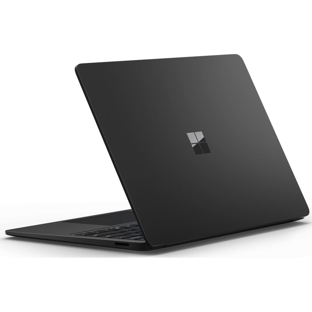 Un ordinateur portable noir avec logo Microsoft, sur fond blanc.