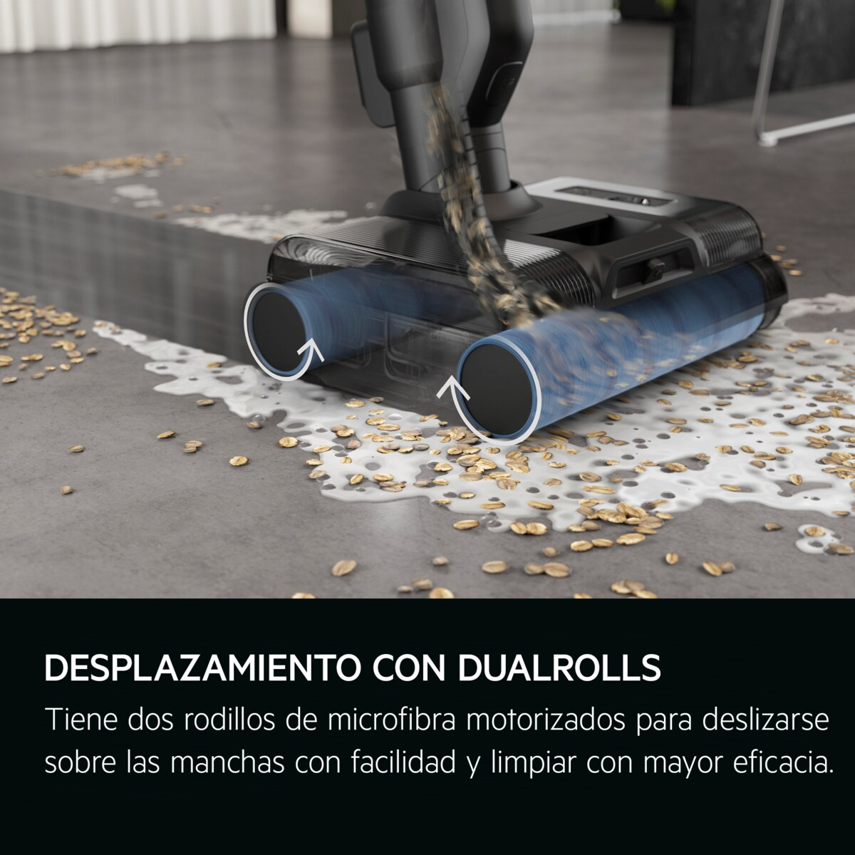 Aspirapolvere con due rulli rotanti che puliscono avena e liquido.